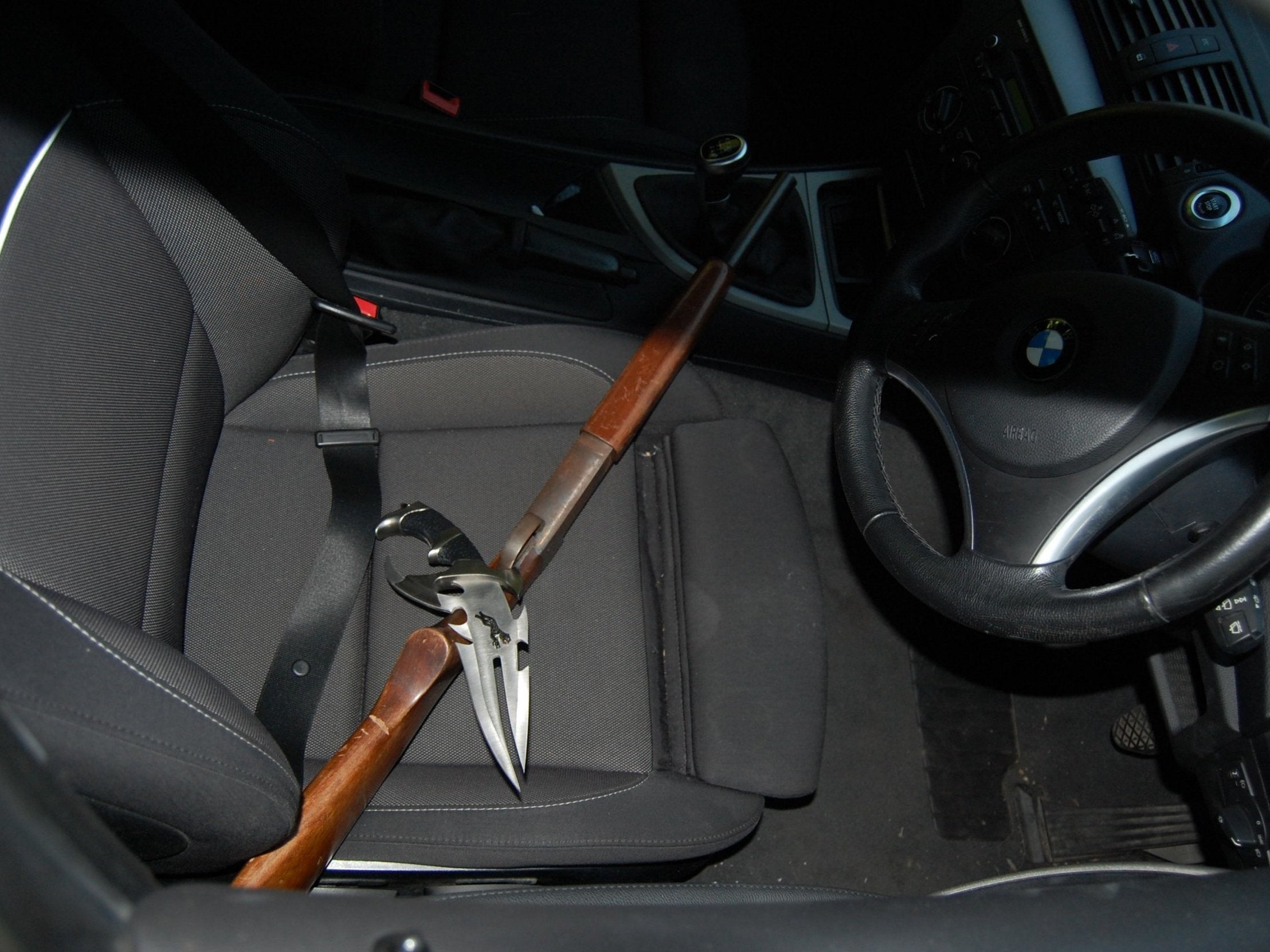 Gun and zombie knife found in car by police investigating four east London men