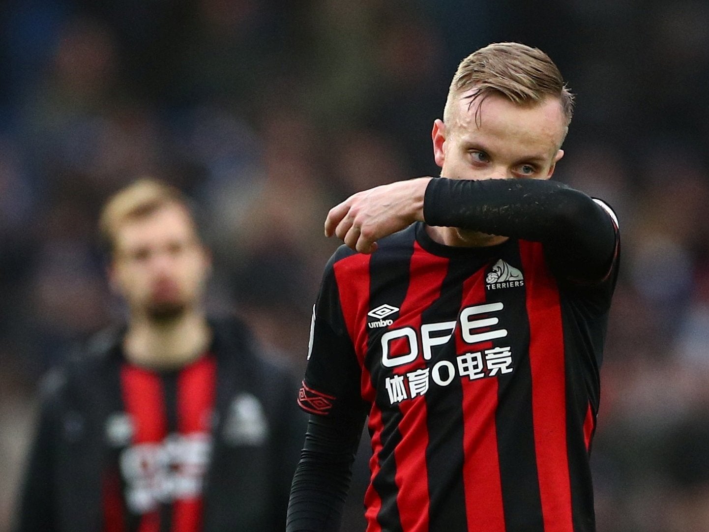 Huddersfield Town's Florent Hadergjonaj looks dejected at the end of the match