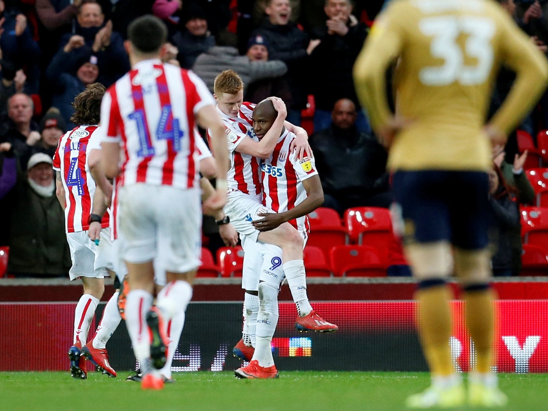 Benik Afobe celebrates scoring Stoke’s second goal