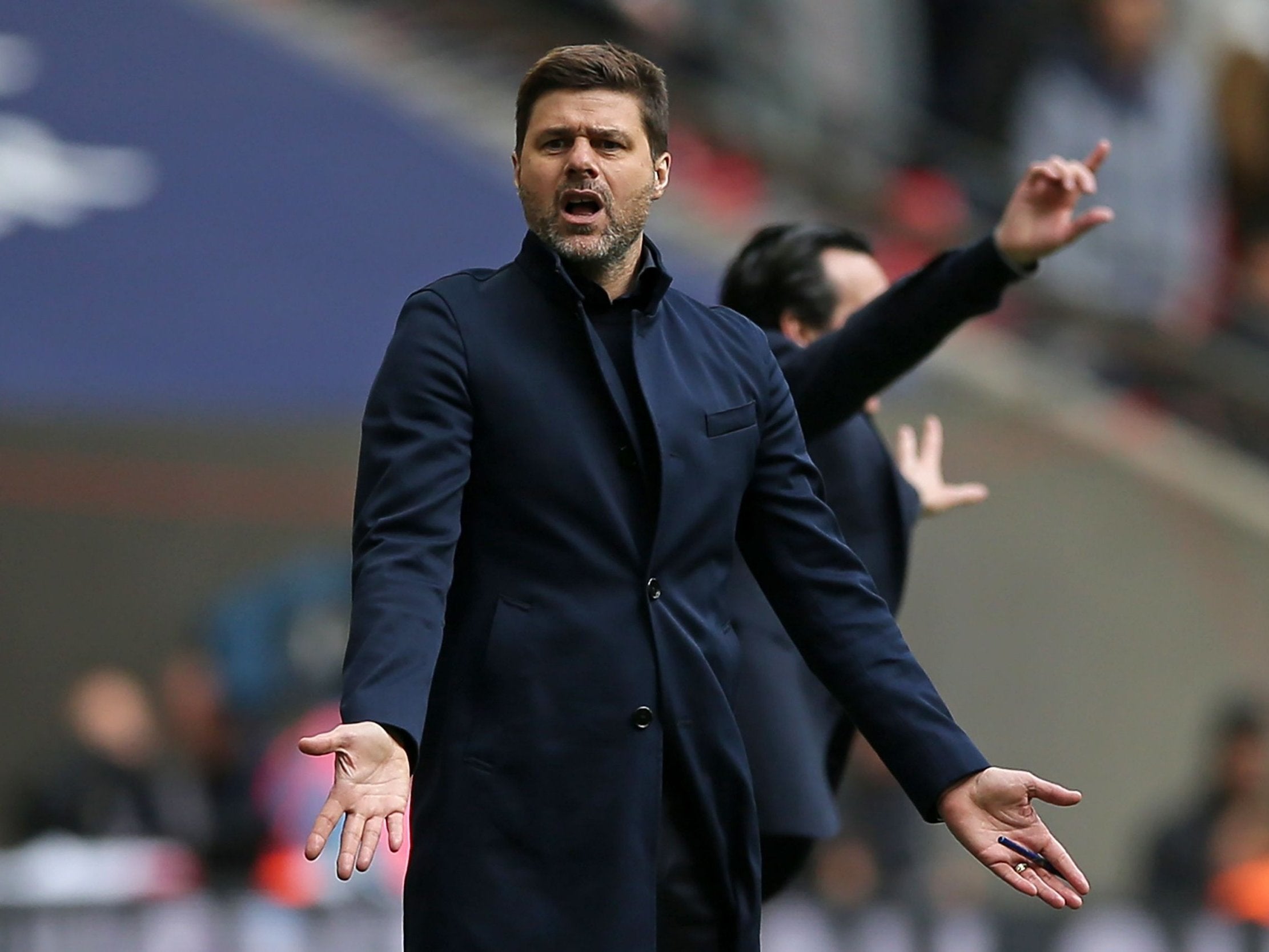 Mauricio Pochettino protests during the north London derby