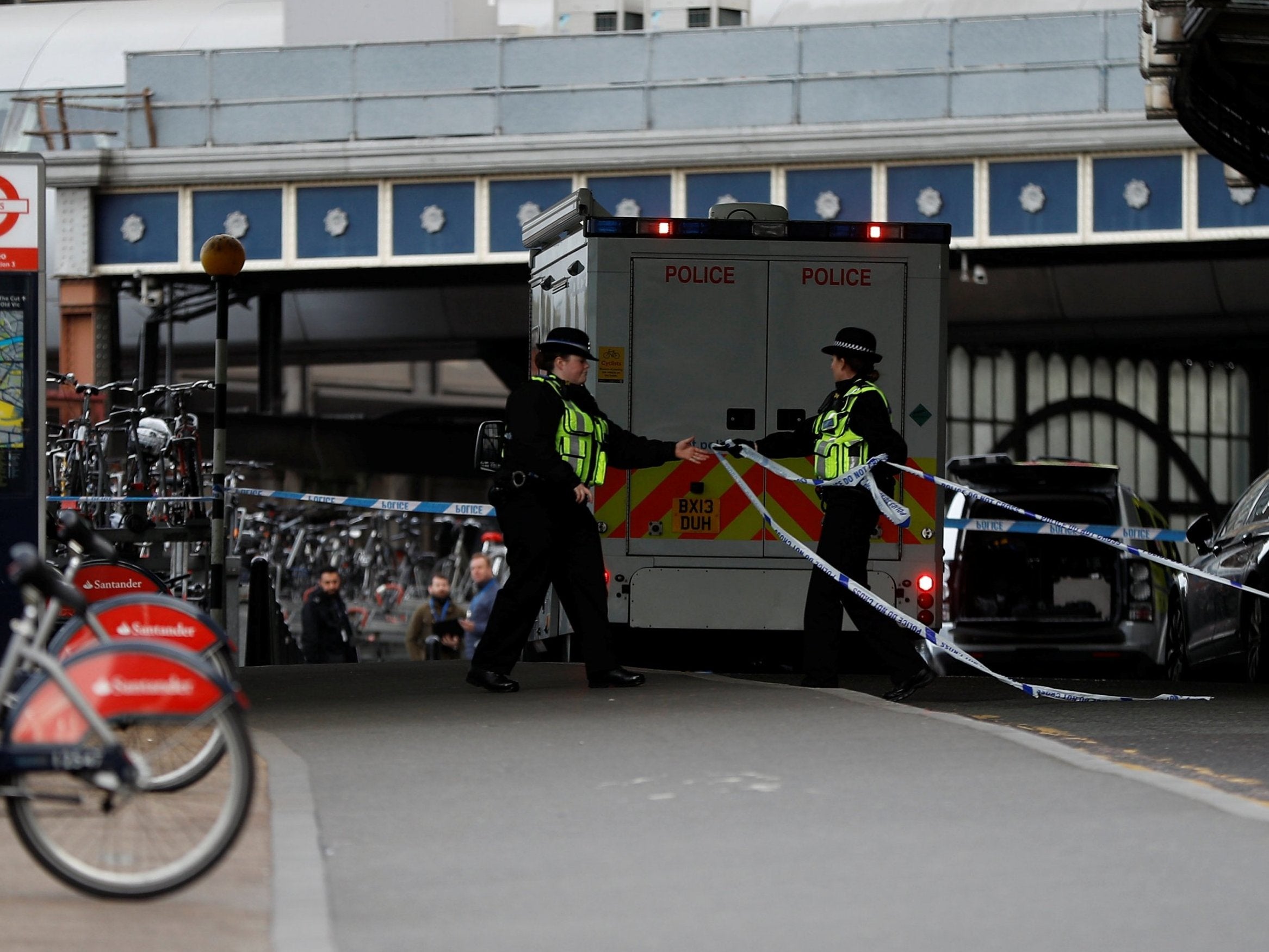 Police officers secure the scene at Waterloo (Reuters)