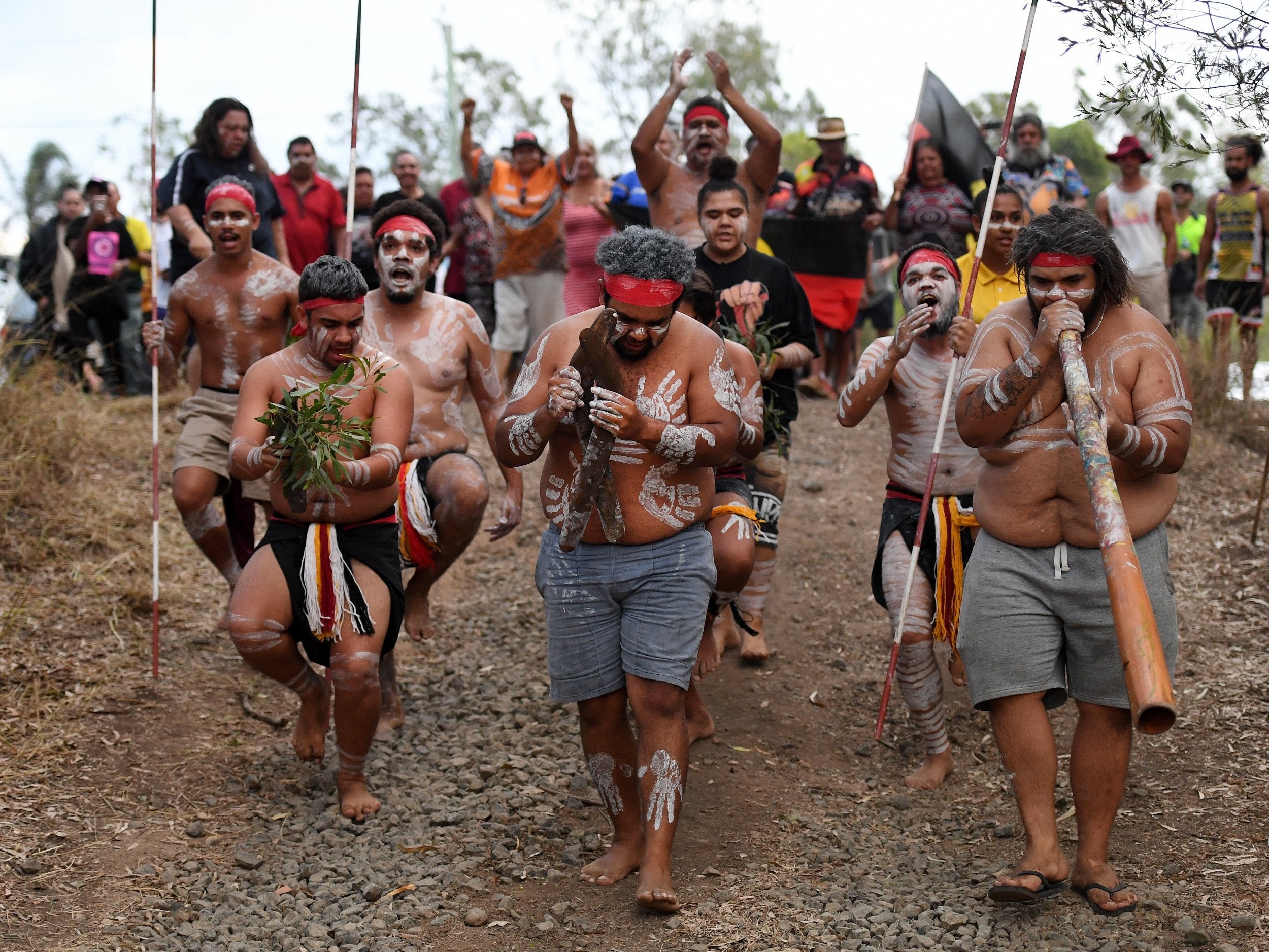 Indigenous protesters have been opposing housing construction around a sacred aboriginal mission and cemetery in Queensland