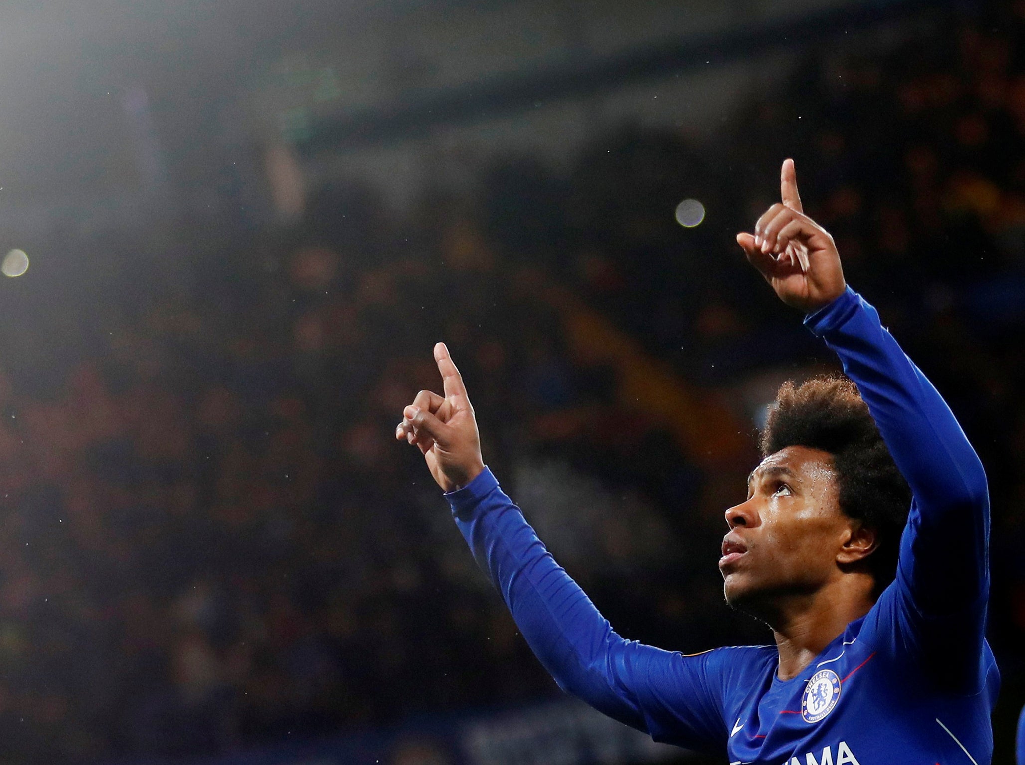 Willian celebrates his wonderfully taken goal