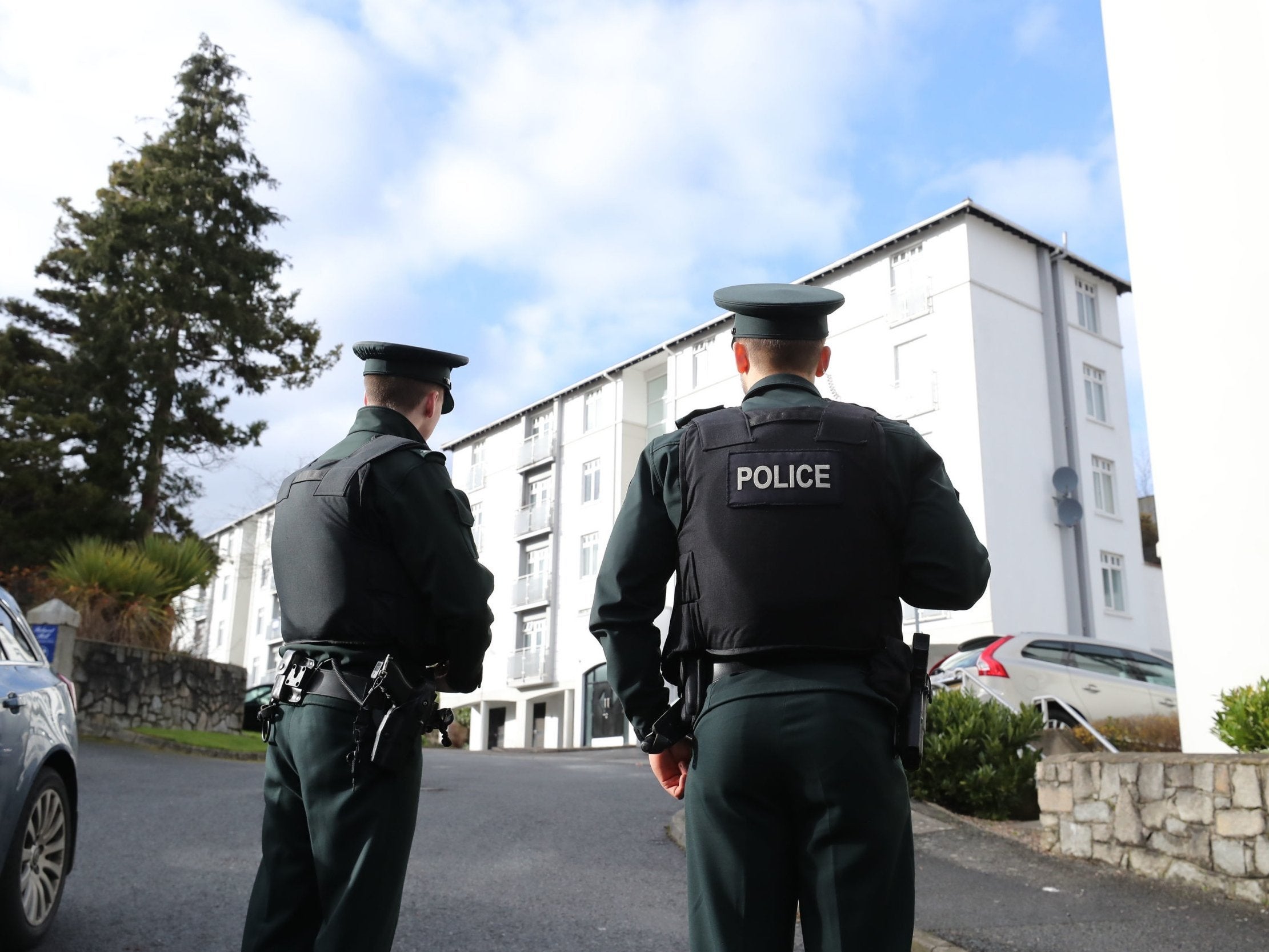 Police outside flats at Glin Ree Court in Newry, County Down