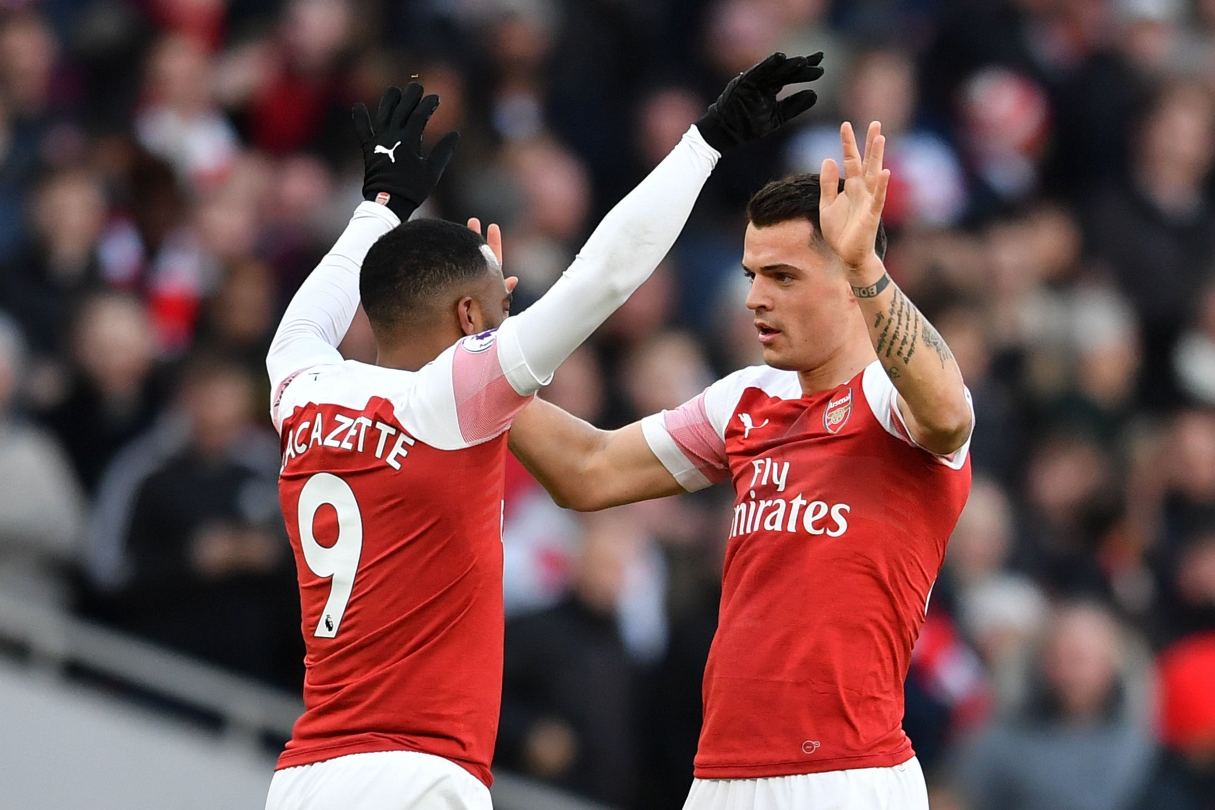 Xhaka and Lacazette celebrate