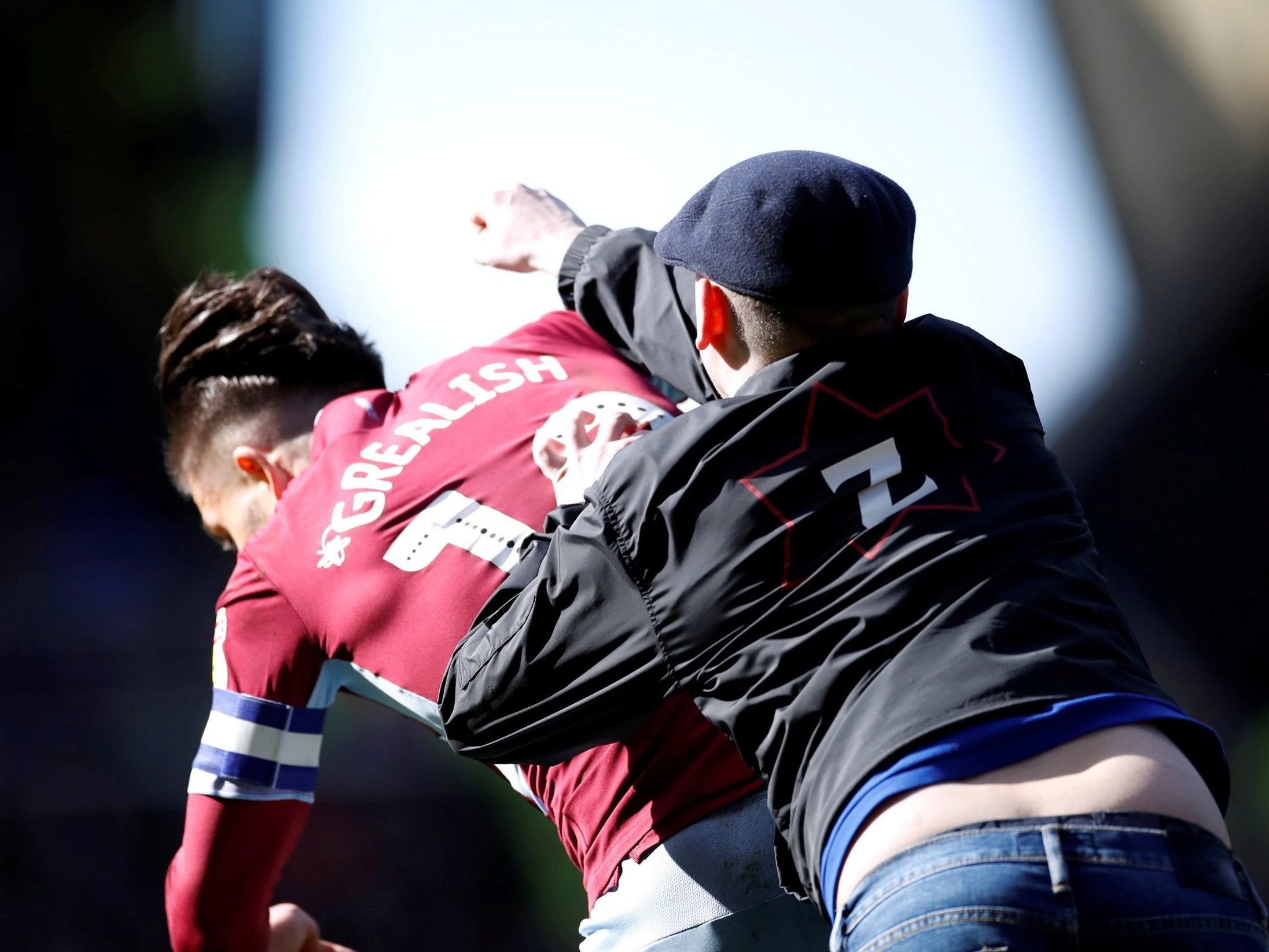 A fab throws a punch at Jack Grealish