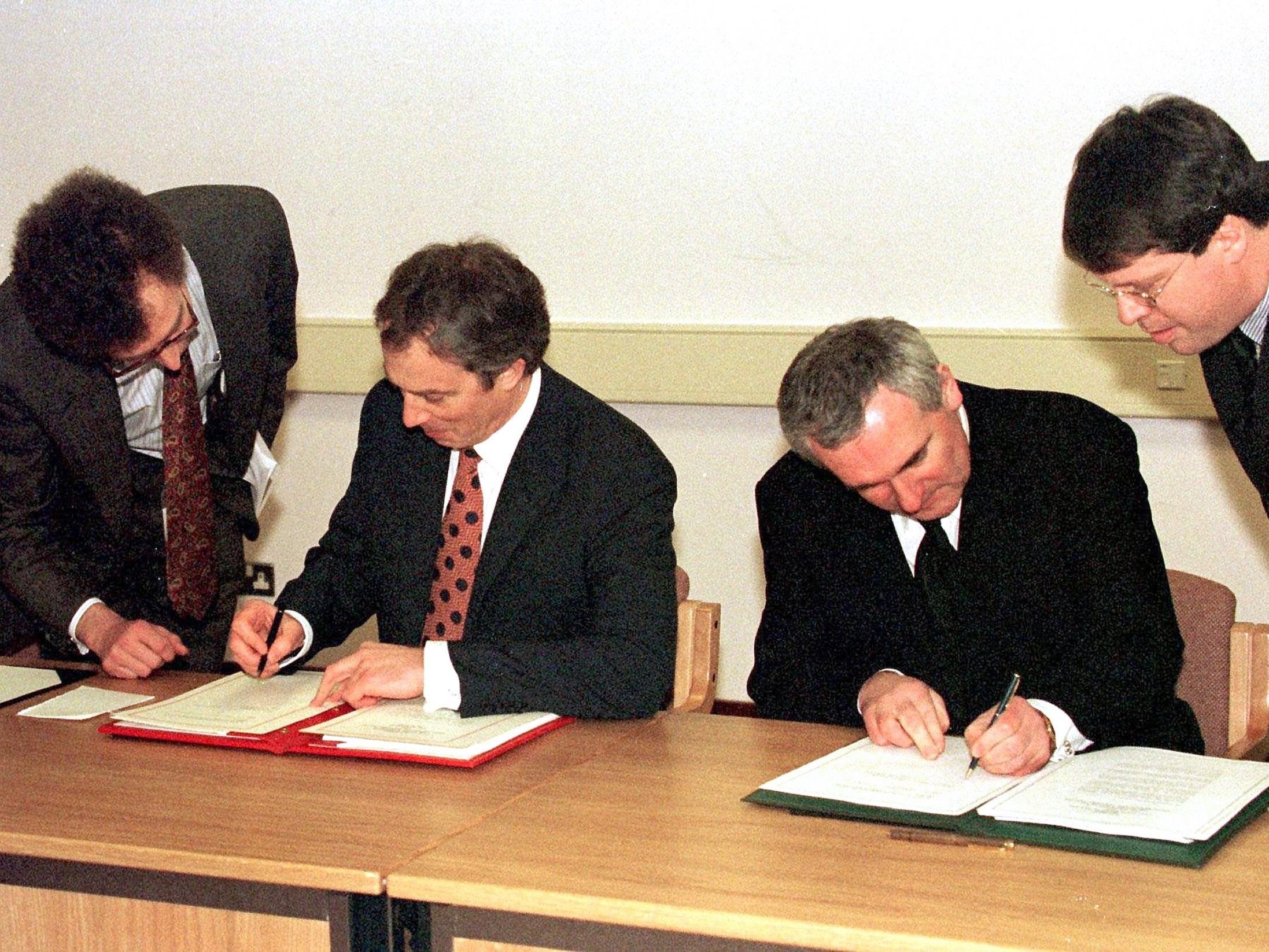 A done deal: Tony Blair and Irish taoiseach Bertie Ahern sign the Good Friday Agreement in 1998