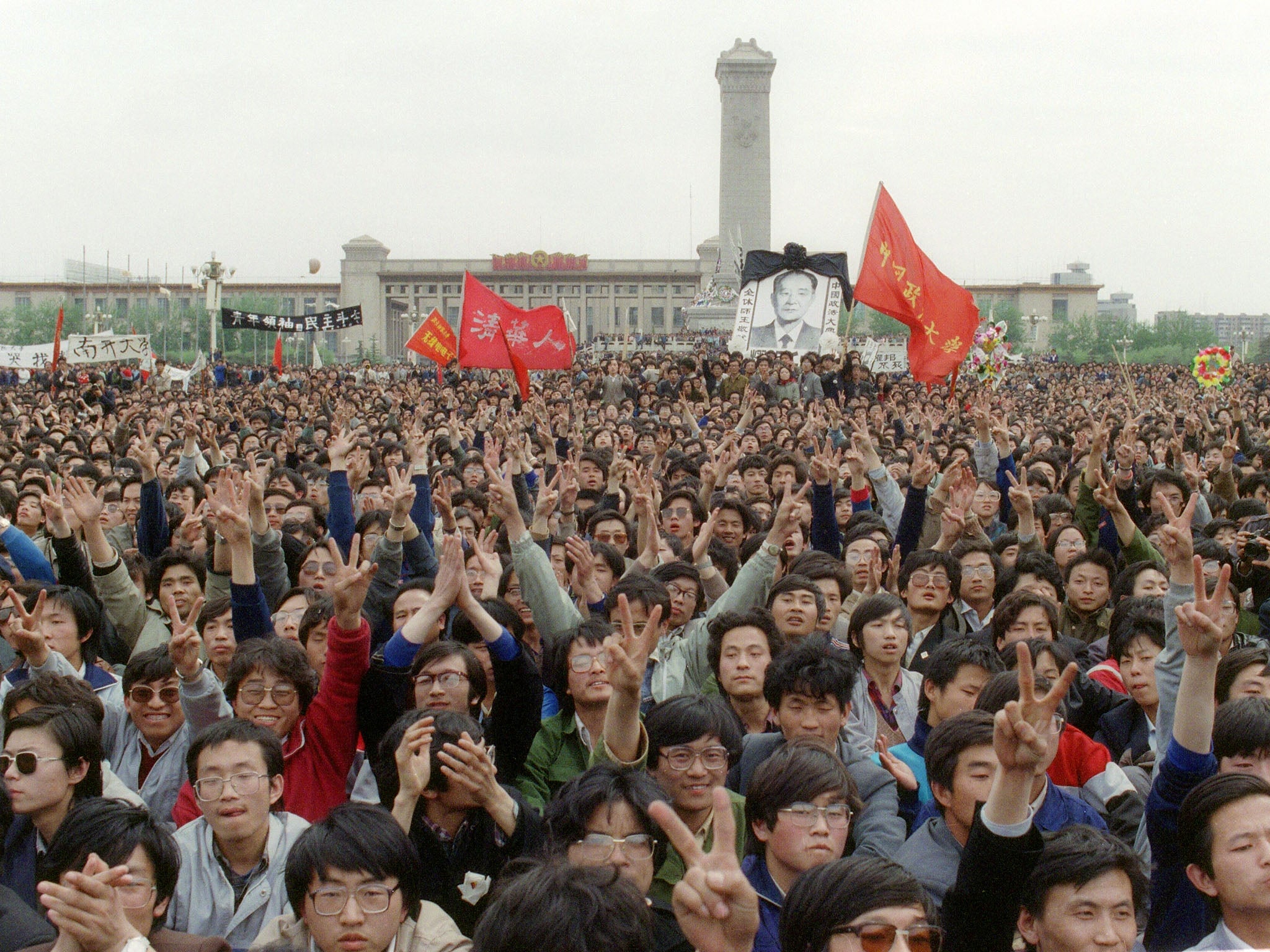 Thousands of students gather in Tiananmen Square during an unauthorised demonstration to mourn the death in April 1989 of Hu Yaobang (AFP/Getty)