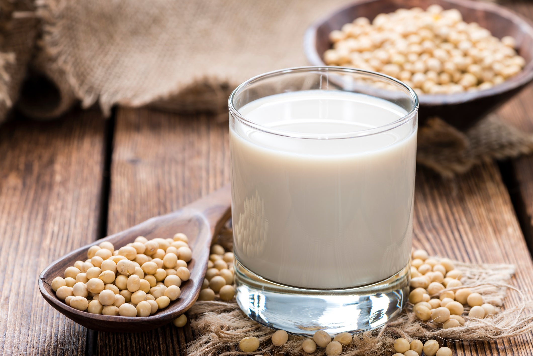 Glass with Soy Milk and Seeds on wooden background (Getty Images/iStockphoto)