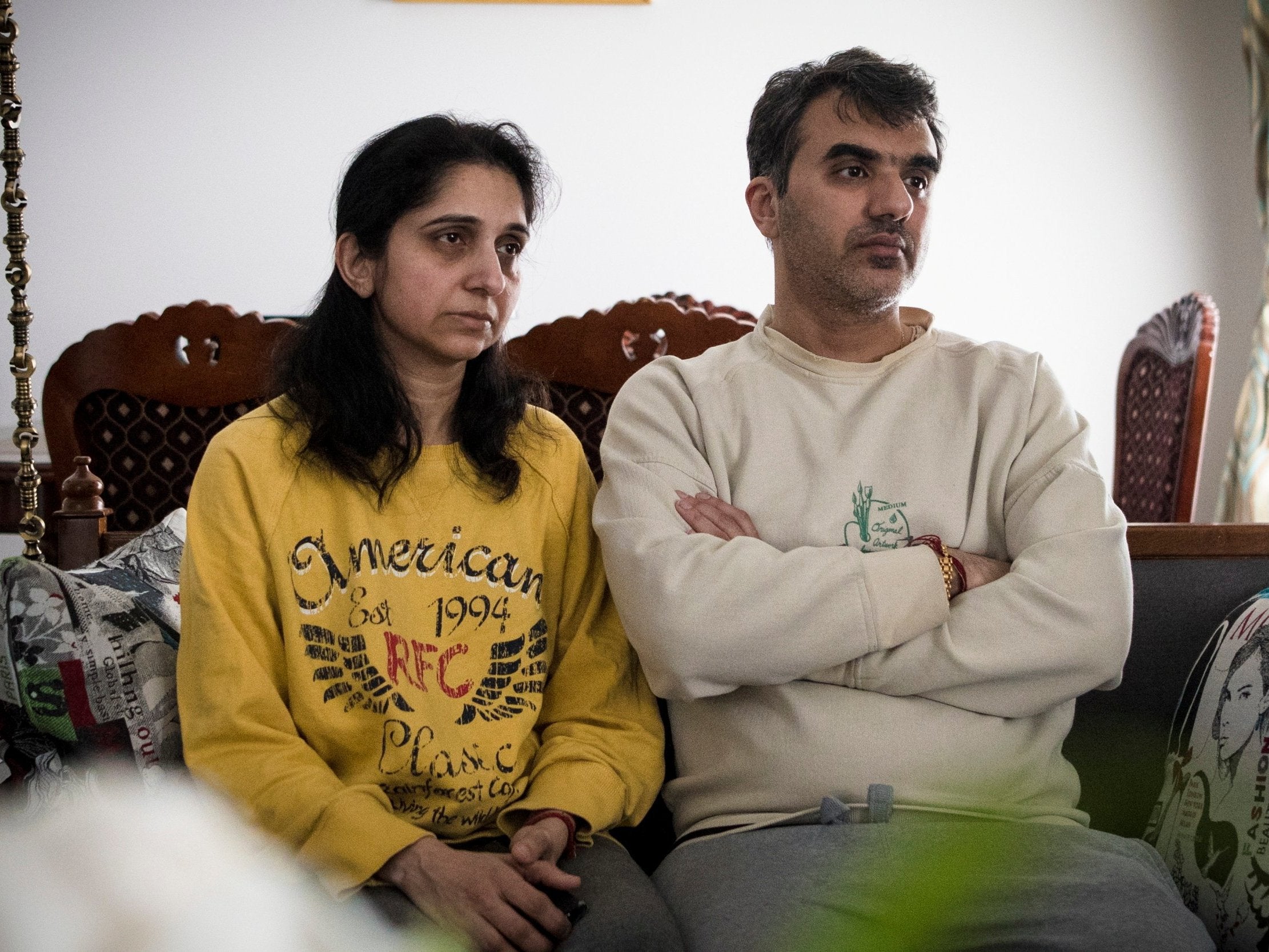 Manant Vaidya is joined by his wife Hiral, left, as he speaks about losing his two parents, sister, brother-in-law, and two young nieces in the crash of an Ethiopian Airlines jetliner 10 March 2019.