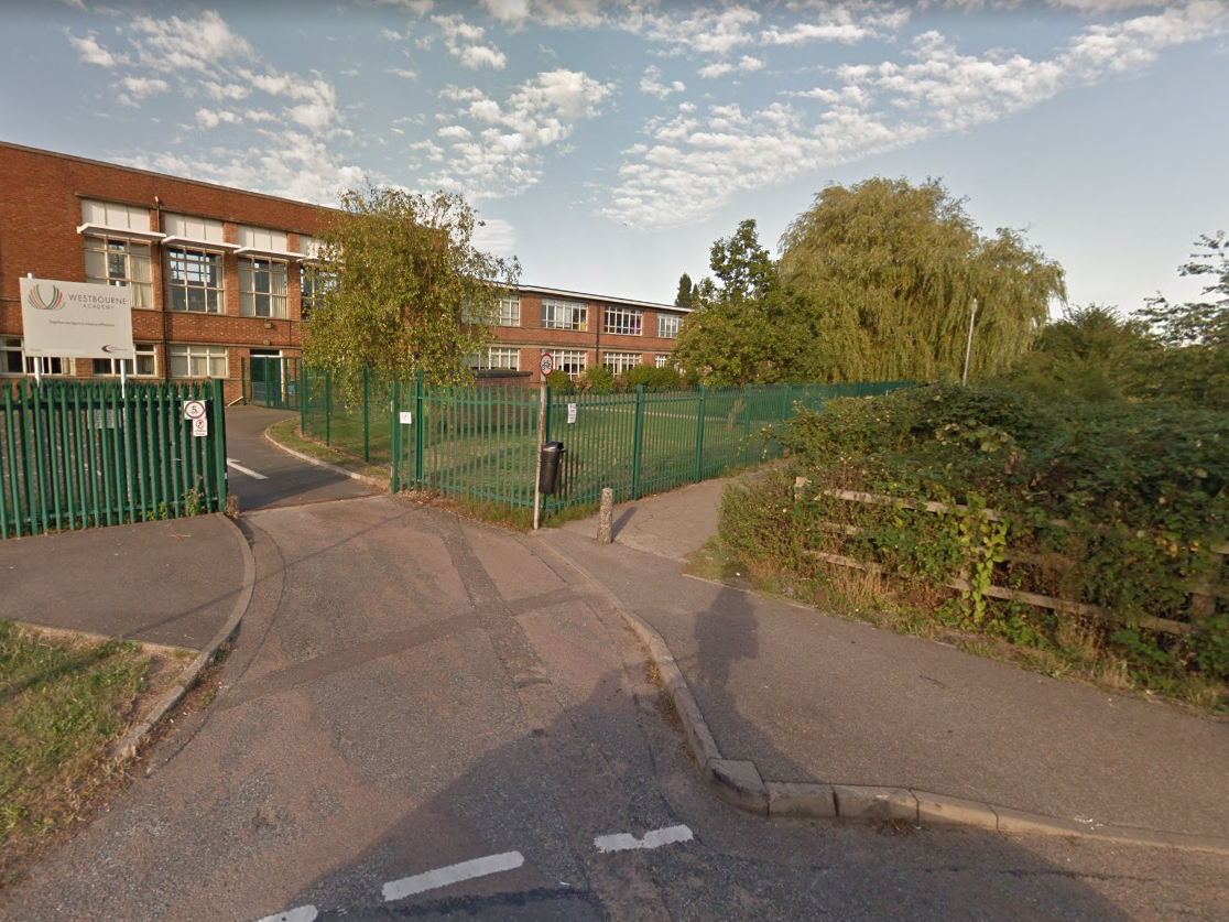 A view of Marlow Road. Police have erected a cordon at the entrance to this alleyway