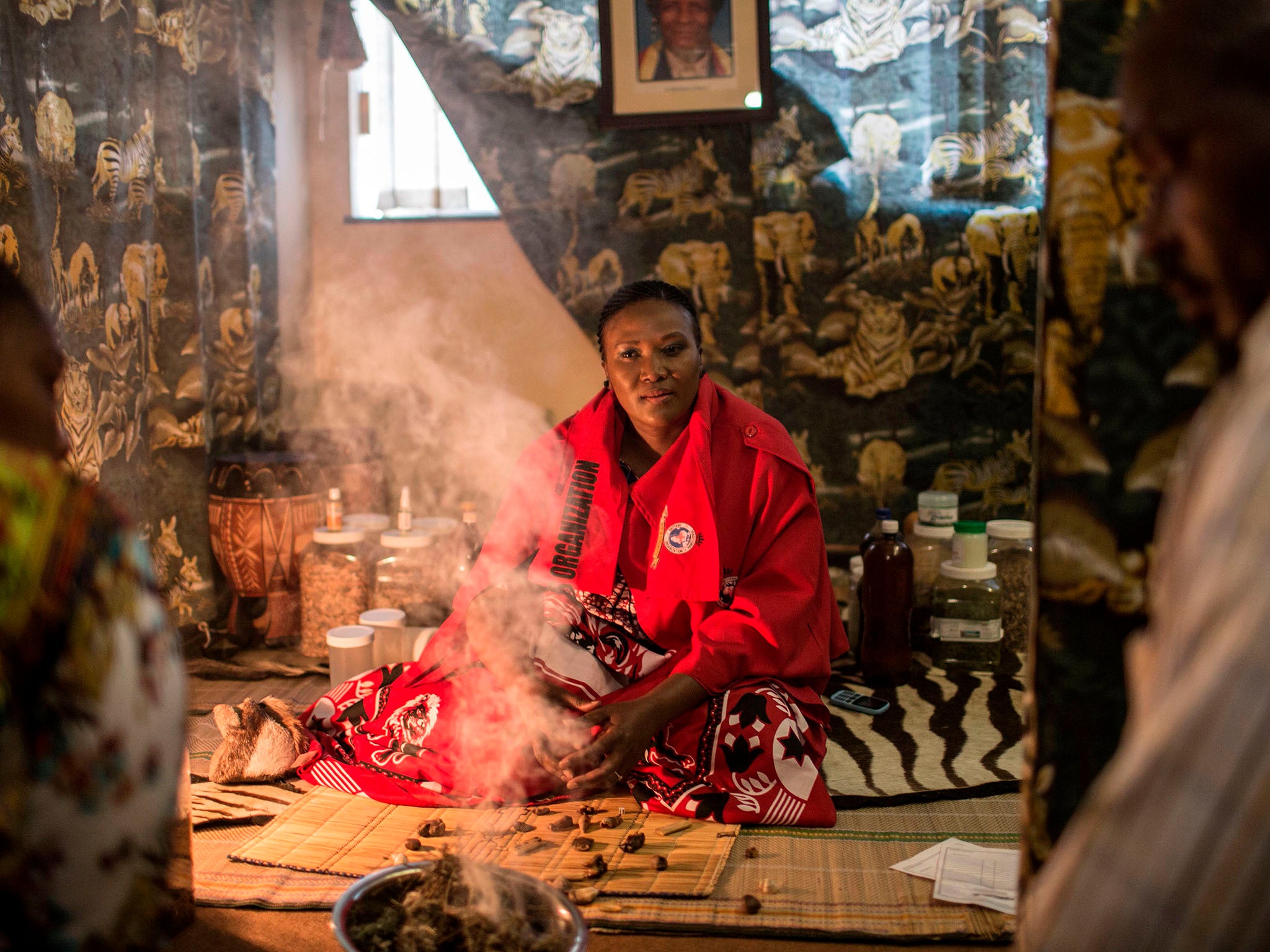 Traditional healer Gogo Phephisile Maseko attends to patients using a blend of cannabis and other herbs in Johannesburg