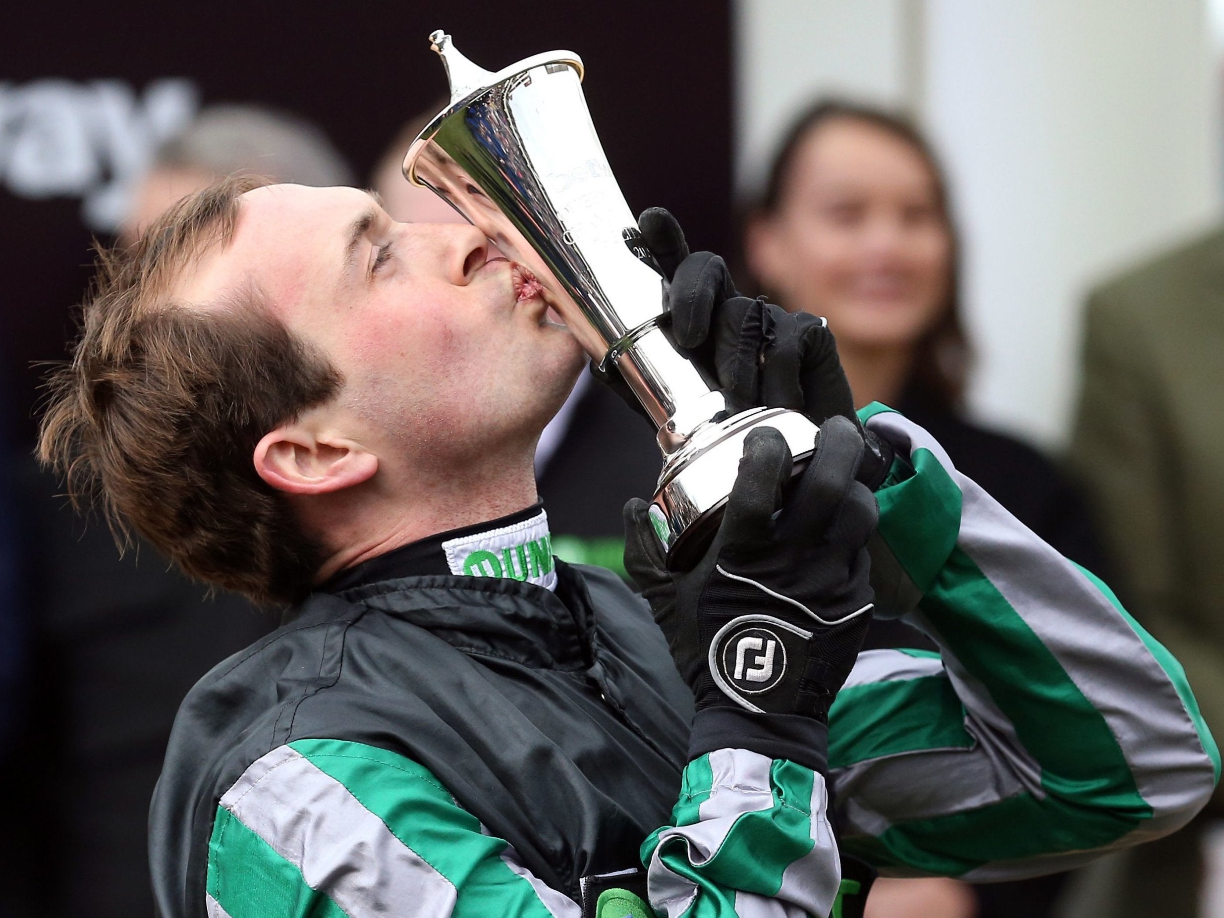 Nico de Boinville celebrates following victory aboard Altior