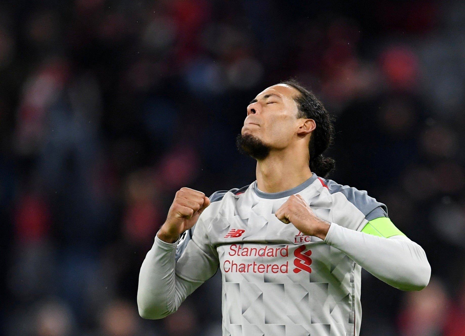 Virgil Van Dijk celebrates in Munich