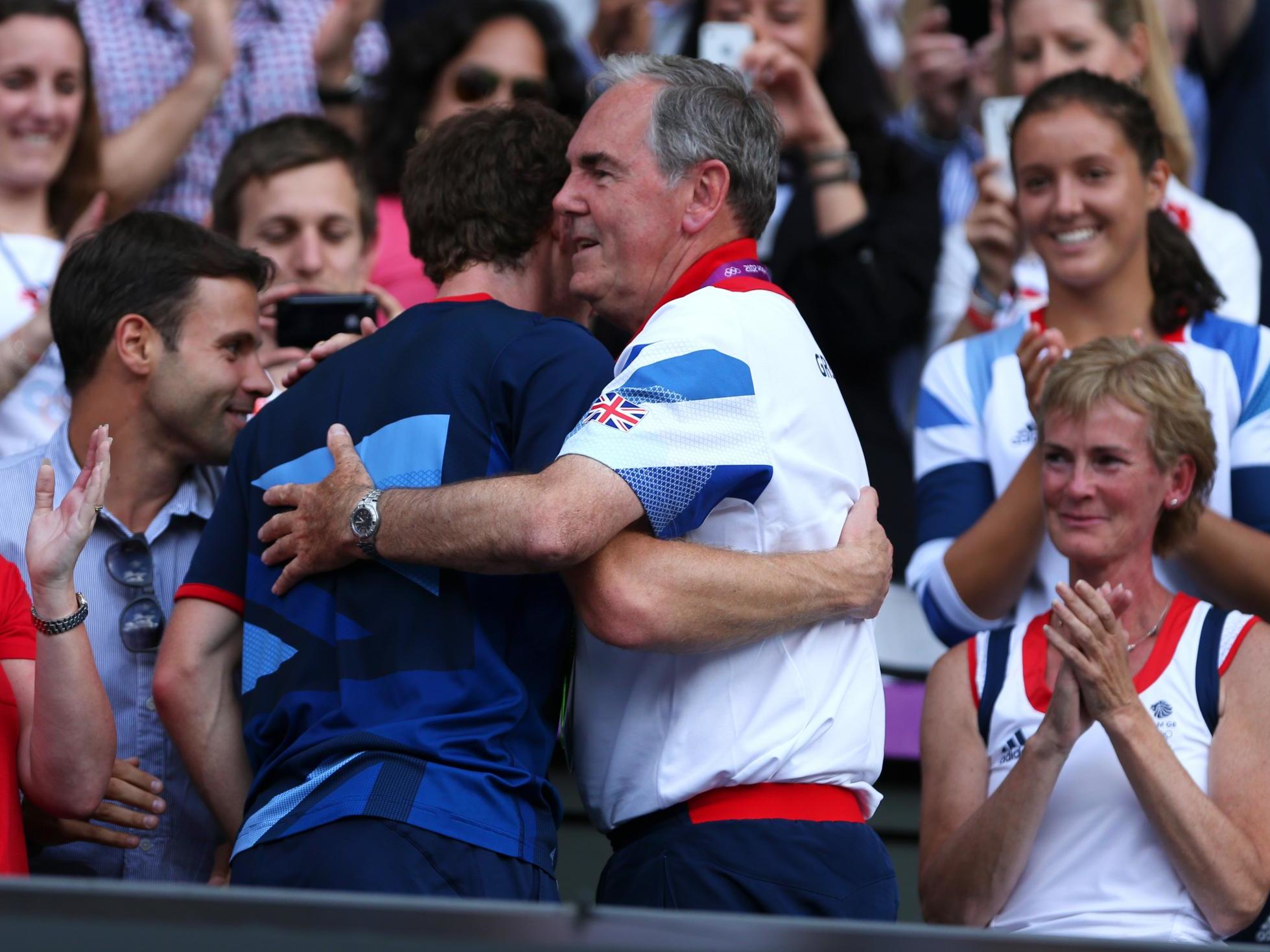 Paul Hutchins hugging Andy Murray after the Scot won Olympic gold