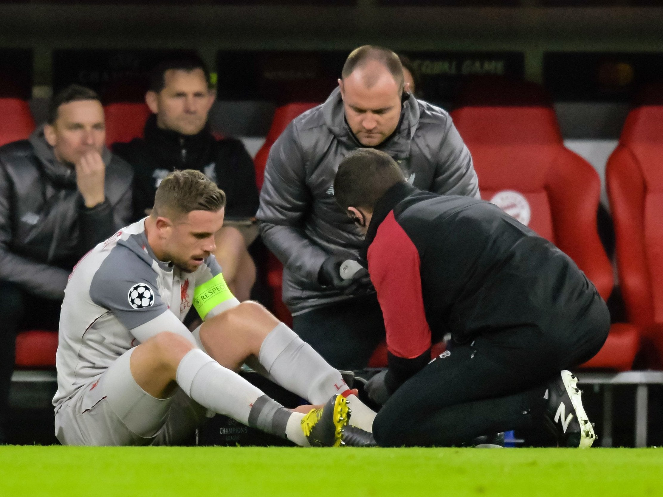 Jordan Henderson receives treatment