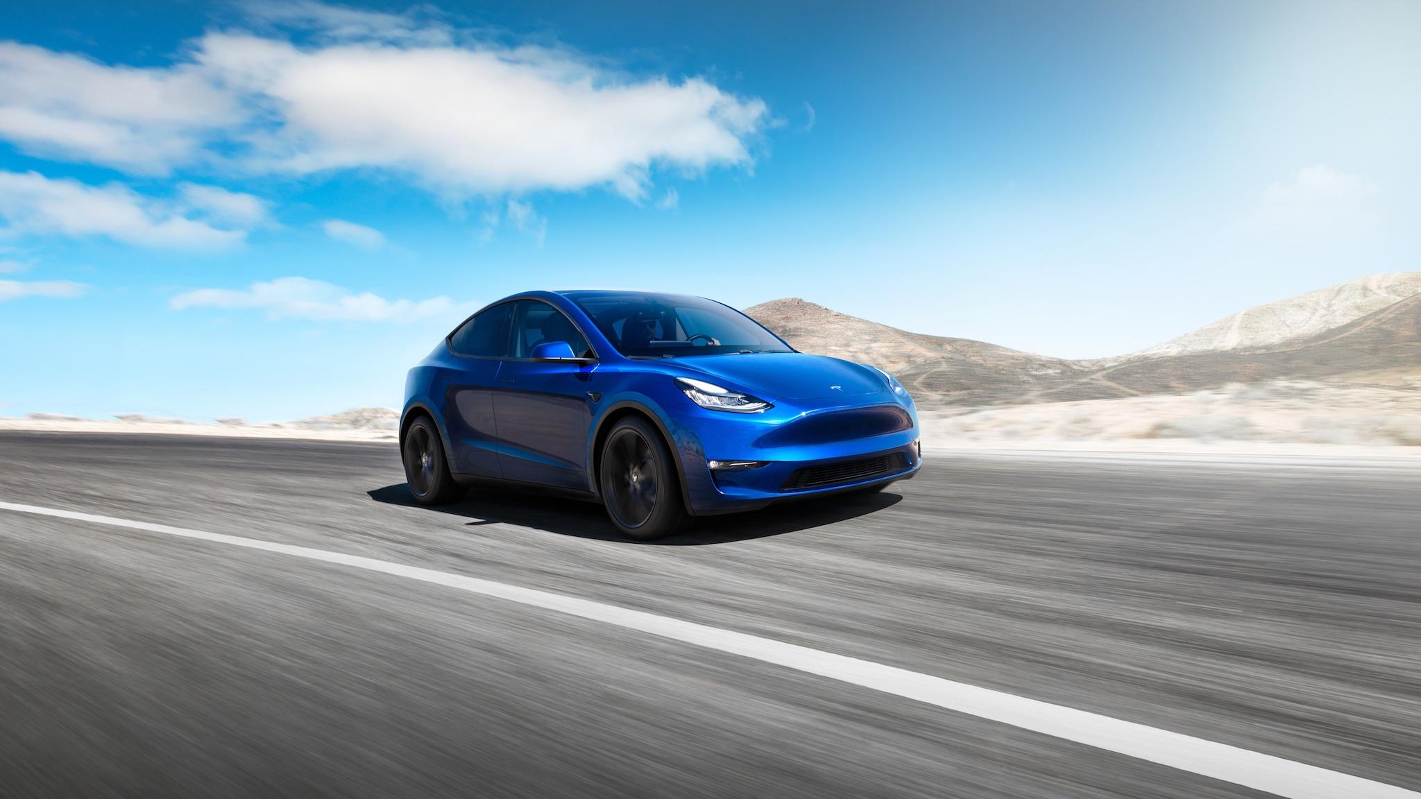 A handout photo dated 07 March 2019 and made available 15 March 2019 by US automobile manufacturer Tesla, showing the new Tesla Model Y electric car that Tesla says will be released as of from 2020