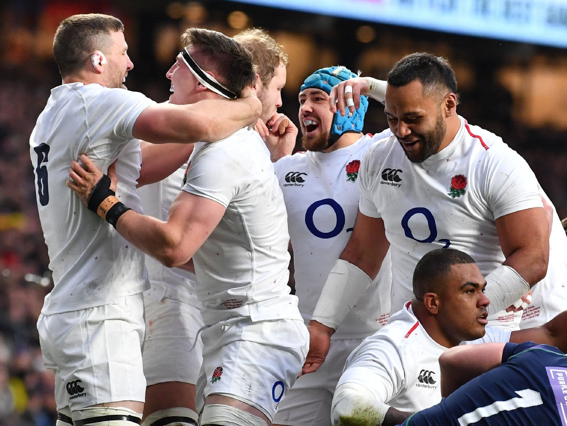 England's flanker Tom Curry celebrates with England's flanker Mark Wilson