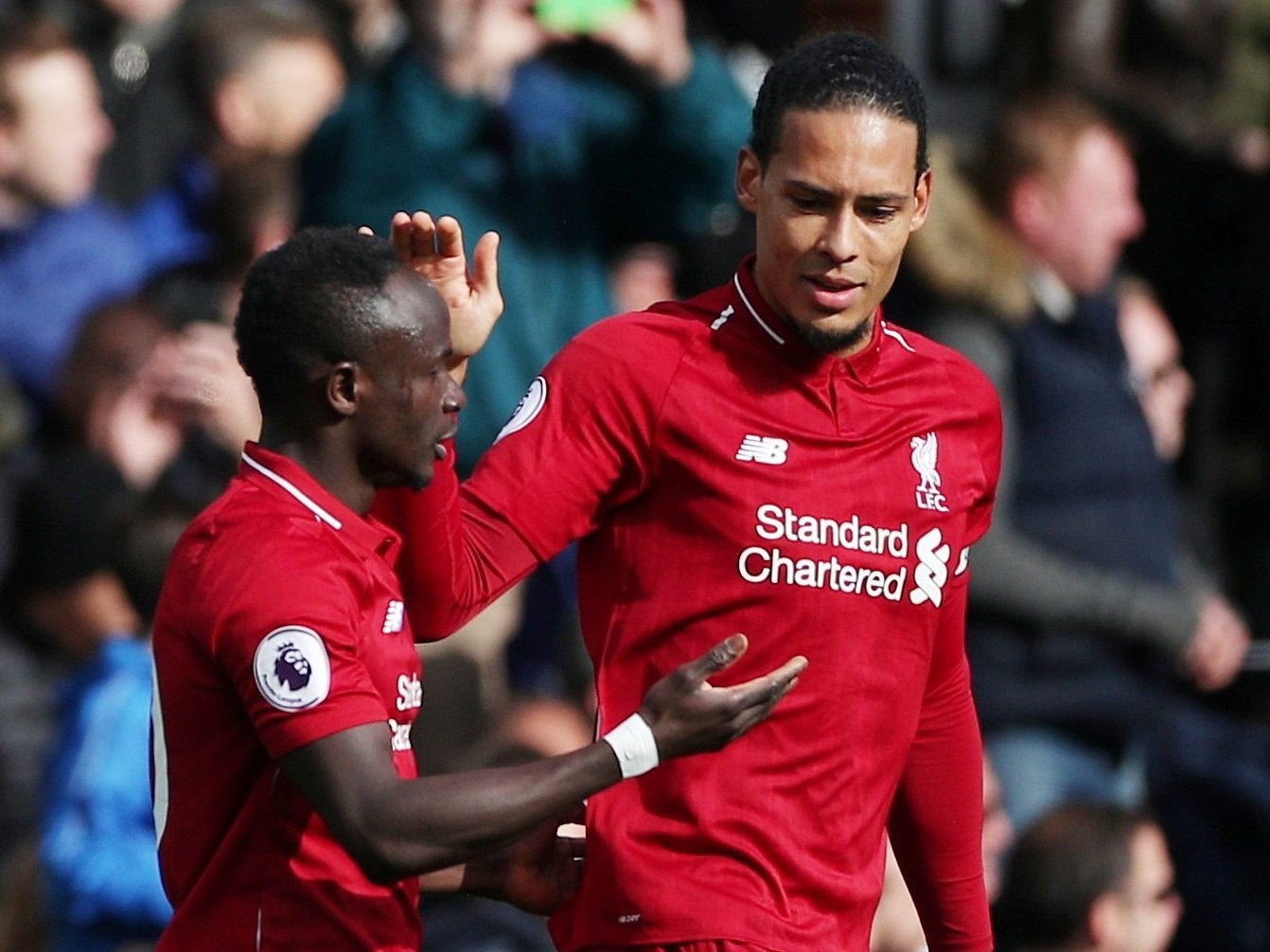 Liverpool's Sadio Mane celebrates scoring with Virgil van Dijk