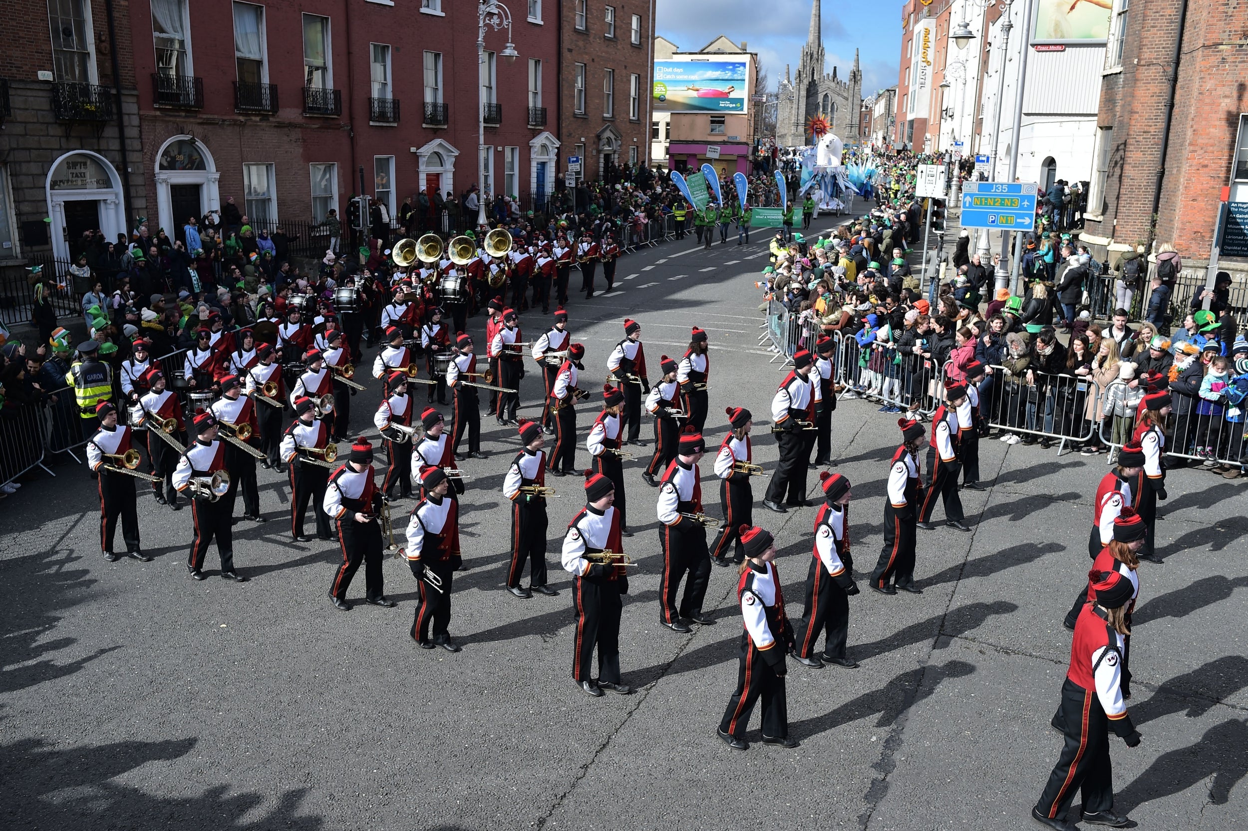 Festival participants take part in the annual Saint Patrick's Day parade on March in Dublin, Ireland. Saint Patrick, the patron saint of Ireland is celebrated around the world on St. Patrick's Day. According to legend Saint Patrick used the three-leaved shamrock to explain the Holy Trinity to Irish pagans in the 5th-century after becoming a Christian missionary