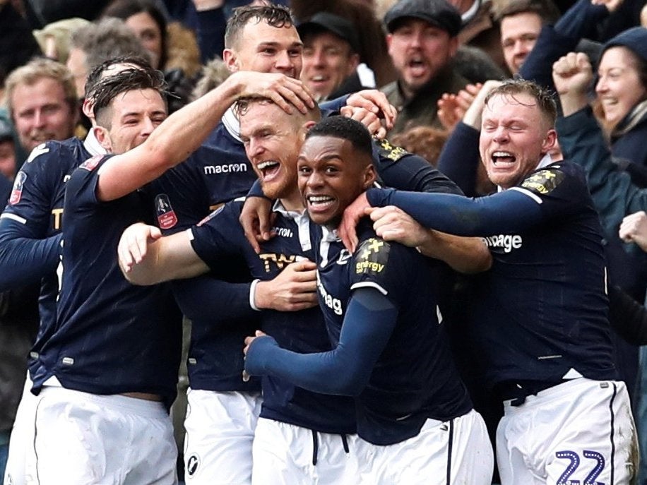 Millwall's Alex Pearce celebrates scoring their first goal against Brighton