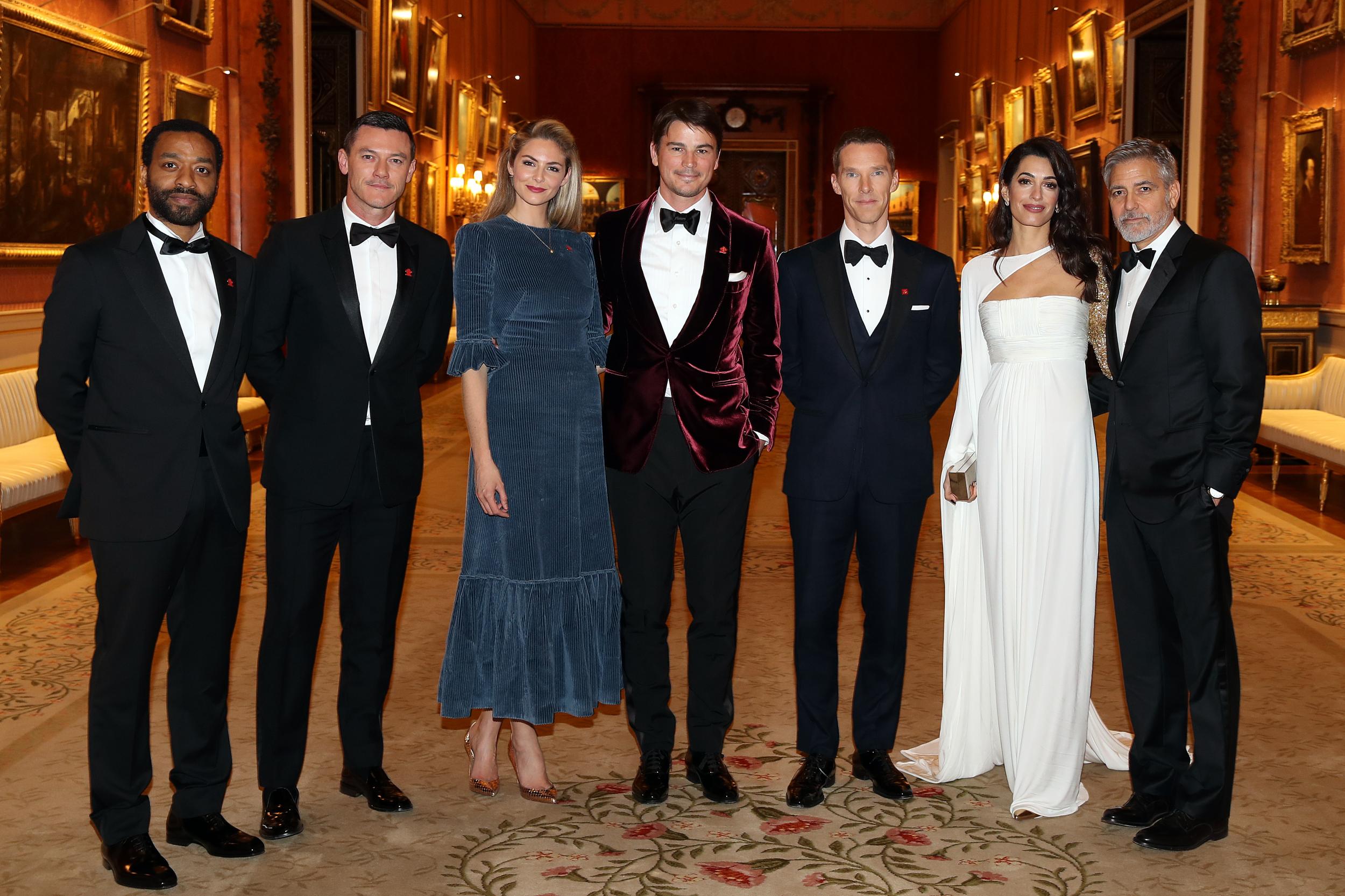 (L-R) Chiwetel Ejiofor, Luke Evans, Tamsin Egerton, Josh Hartnett, Benedict Cumberbatch, Amal Clooney and George Clooney attend a dinner to celebrate The Prince's Trust, hosted by Prince Charles, Prince of Wales at Buckingham Palace on 12 March 2019 in London,