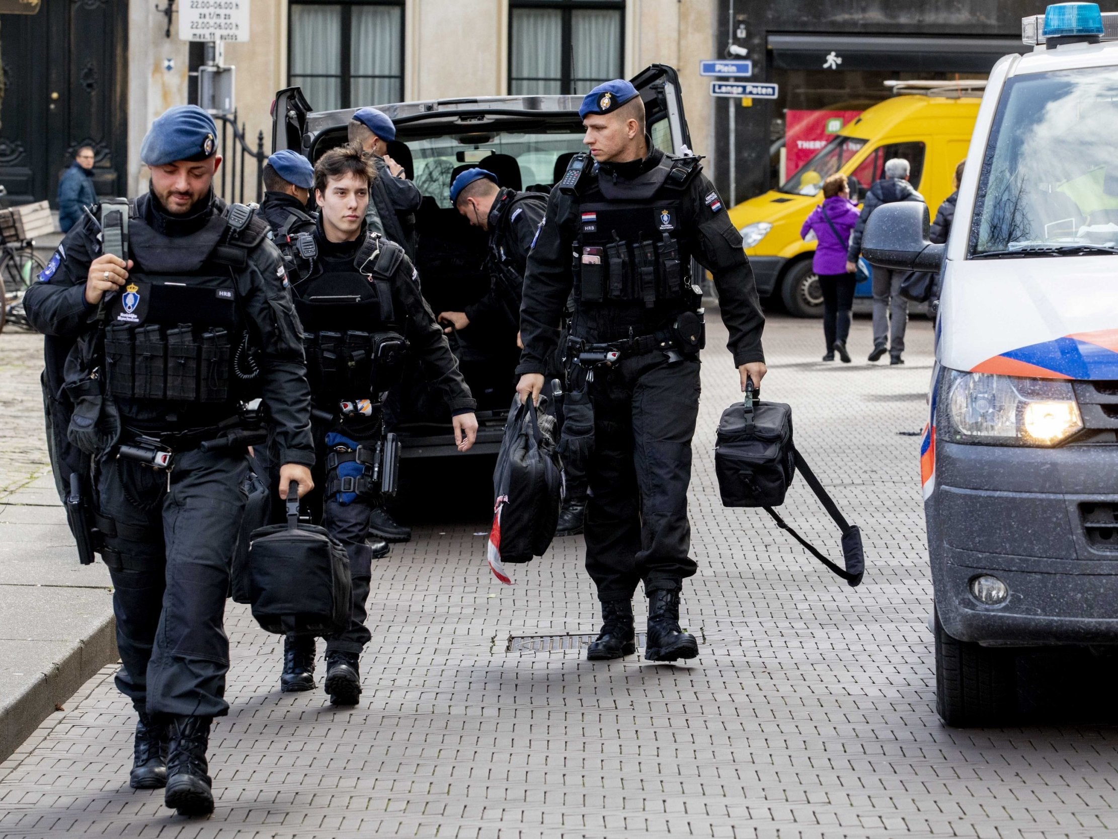 Members of the military police arrive to heighten security around the Binnenhof, a complex of government buildings, in The Hague