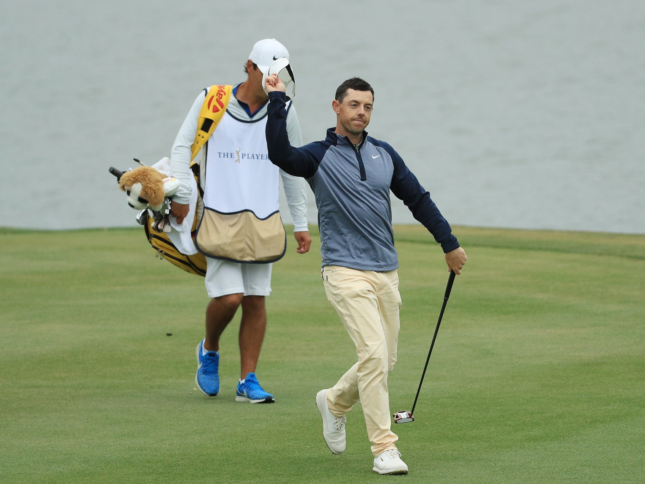 McIlroy celebrates on the 18th at Sawgrass