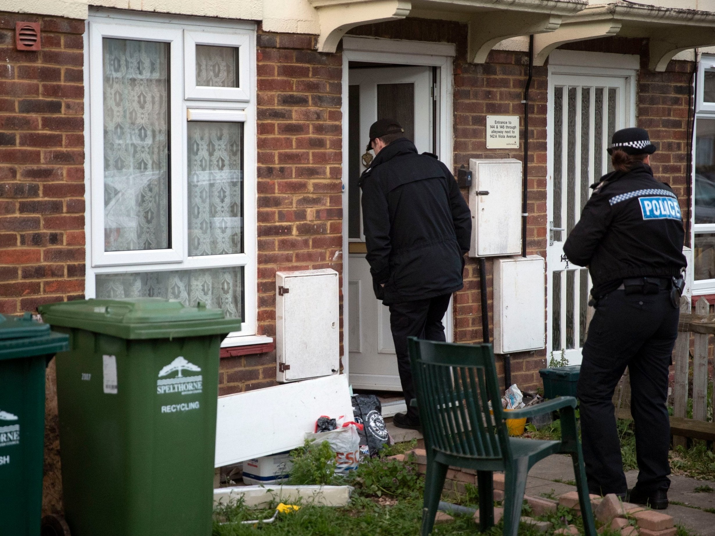 Police in Viola Avenue in Stanwell, Surrey where they are investigating a stabbing in which a man rampaged with a baseball bat and knife while hurling racist abuse.