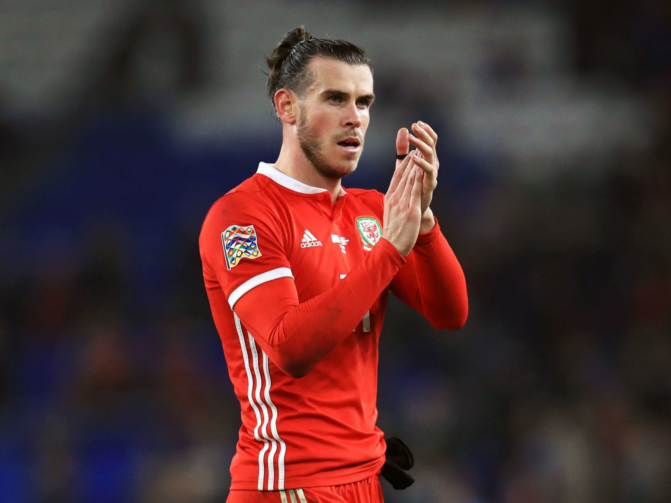 Ryan Giggs wants to ease the pressure of expectation on Gareth Bale