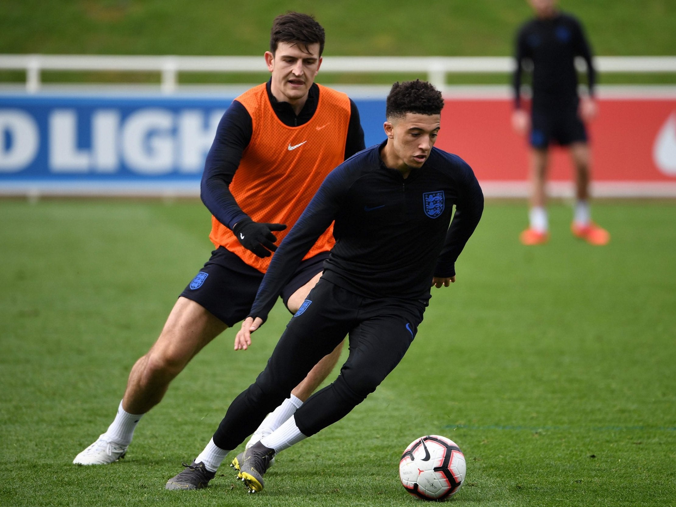 Harry Maguire tracks Jadon Sancho