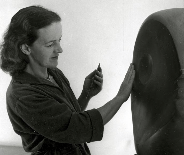 Barbara Hepworth with The Cosdon Head, 1949, photograph by Hans Wild © Bowness