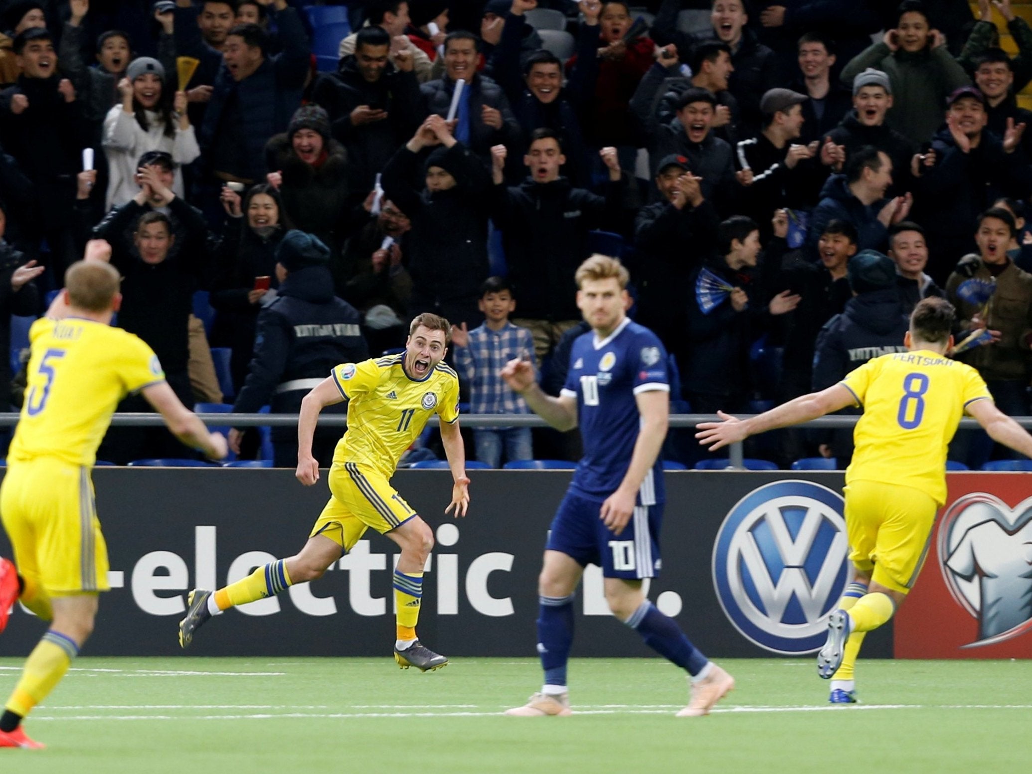 Kazakhstan celebrate their second of the match