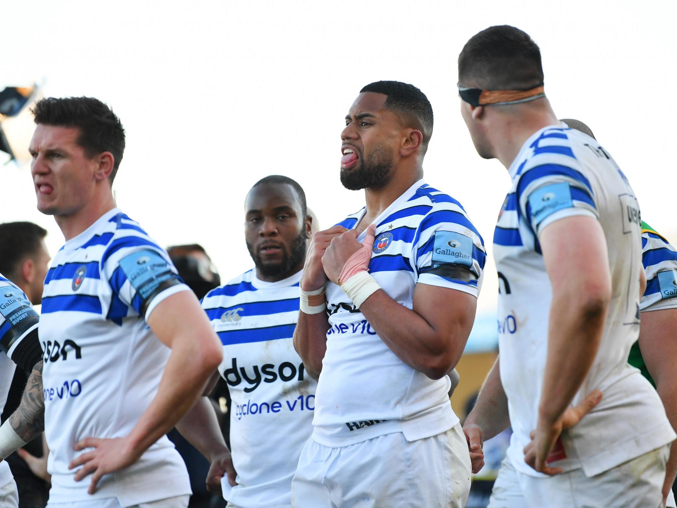 Joe Cokanasiga and his teammates look on after defeat