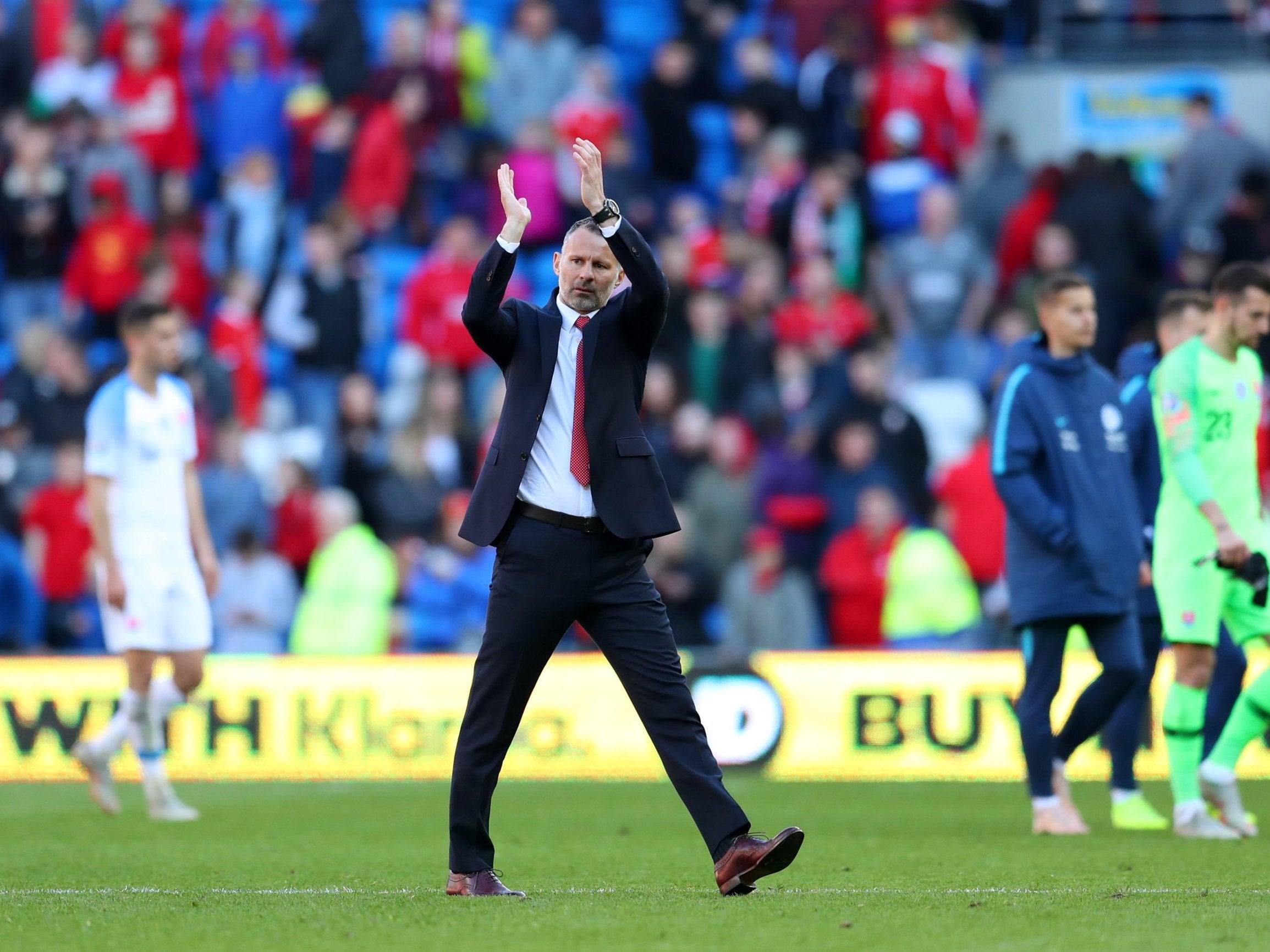 Ryan Giggs applauds the fans inside the Cardiff City Stadium after Wales beat Slovakia