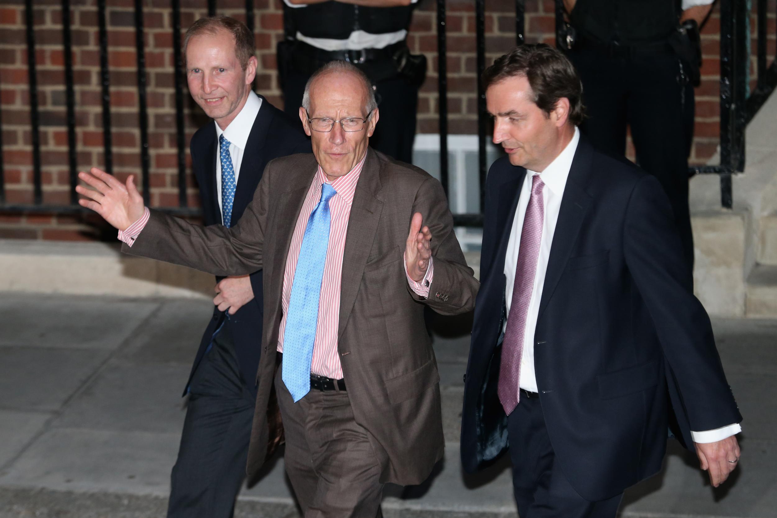 Royal gynaecologists Marcus Setchell (C) and Alan Farthing leave the Lindo Wing following the birth of the son of The Duke and Duchess of Cambridge at St Mary's Hospital on July 22, 2013 in London, England