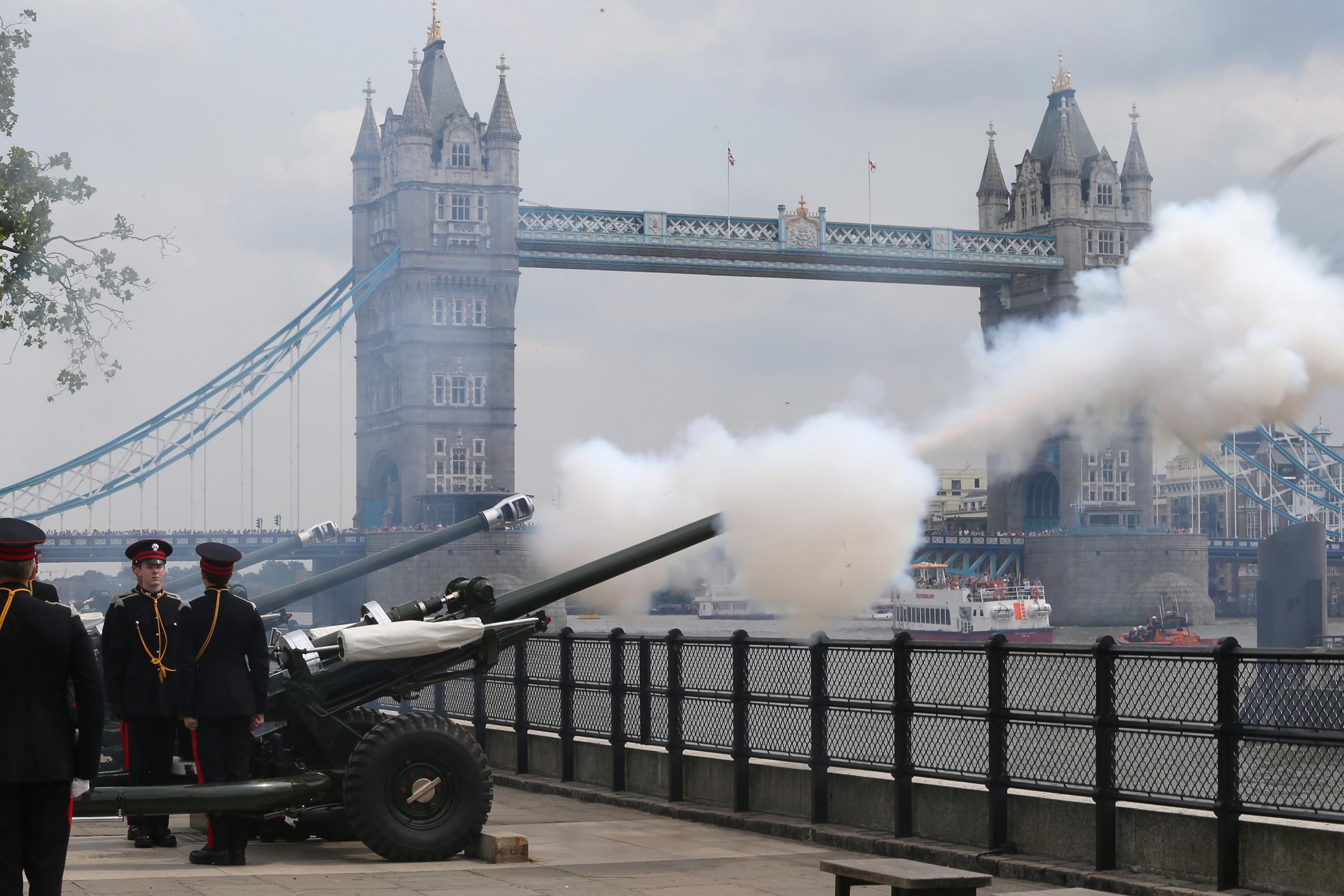 The Honourable Artillery Company fire a 62 round Royal Gun Salute outside the Tower of London to celebrate the birth of the royal baby on July 23, 2013 in London, England