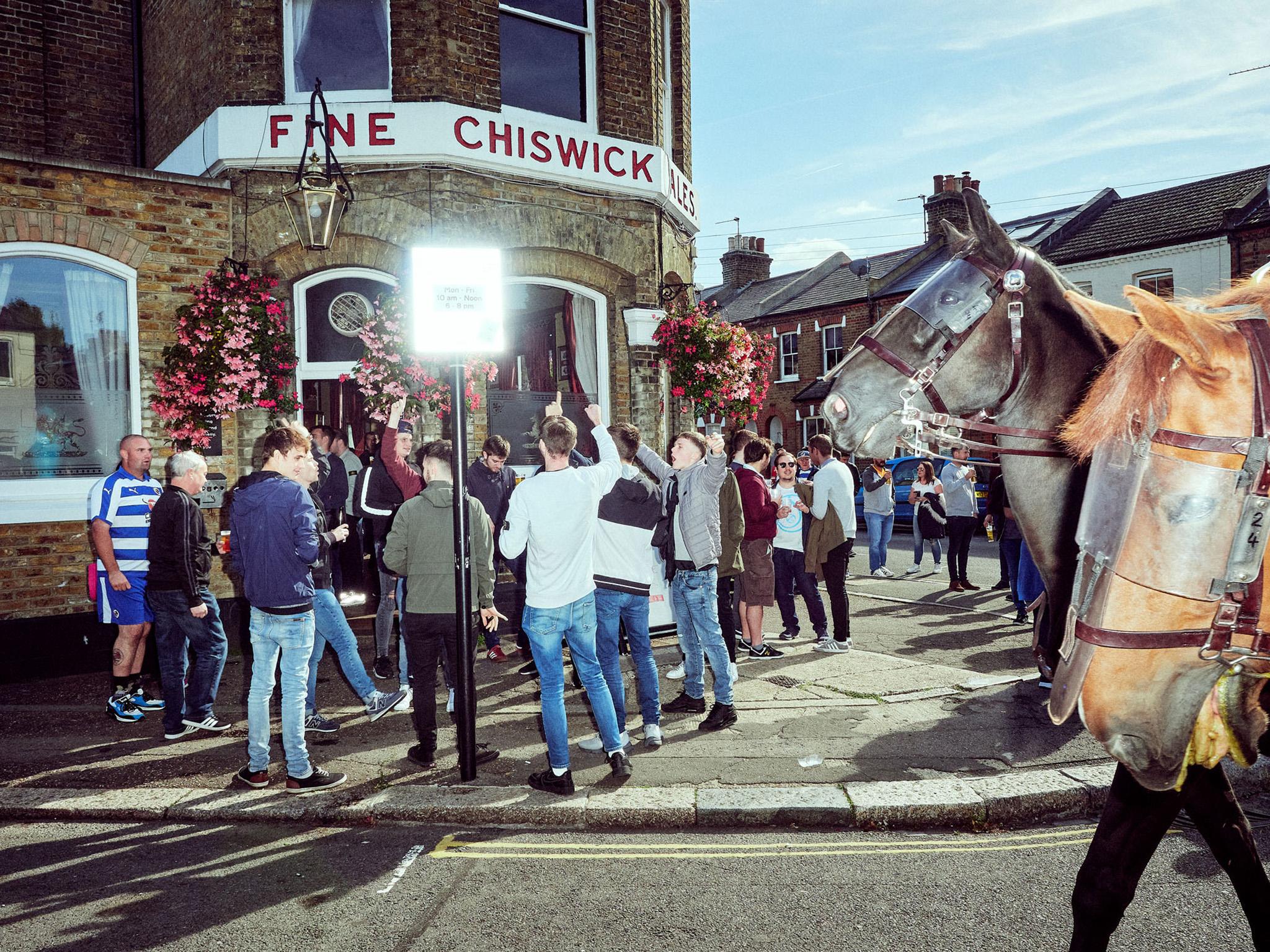 "Outside The Griffin, one of the four pubs encircling the stadium, the Reading fans are cheering. With the final score of 2-2, they are the ones who have something to celebrate. Even though it has gone a bit downhill since the football club between 2006 and 2008 spent two seasons in Premier League." - Thomas Nielsen