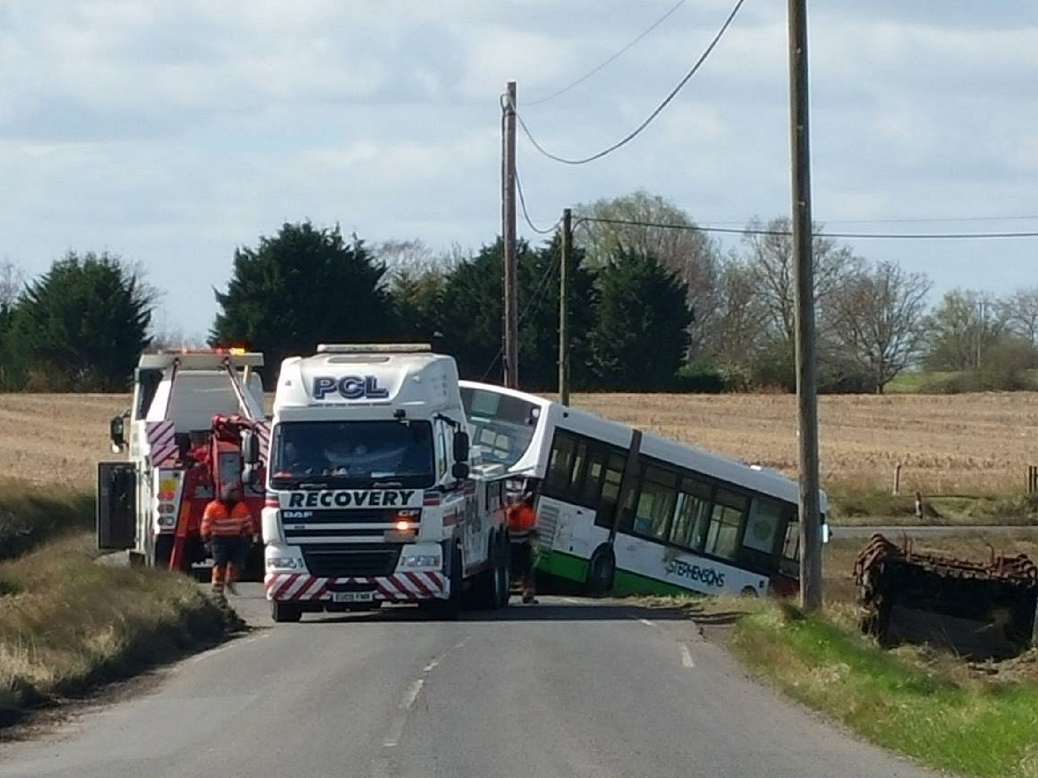 Emergency services had to rescue a bus driver and a passenger after a bus drove through high tide water and became stuck in a ditch in Wallasea Island, Essex, on 23 March 2019.