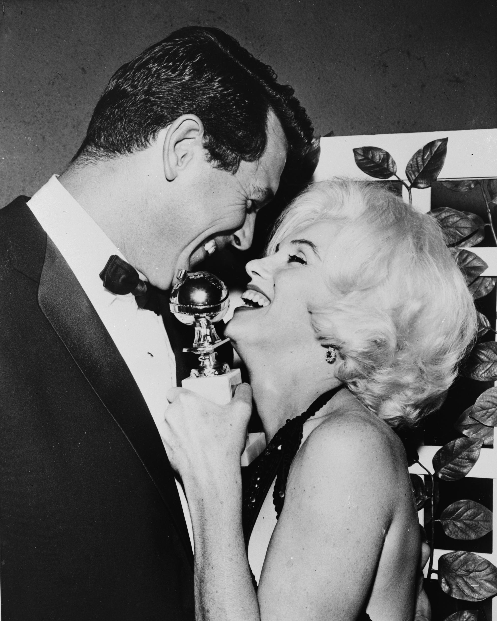 Rock Hudson and Marilyn Monroe at the 1962 Golden Globes, months before her death