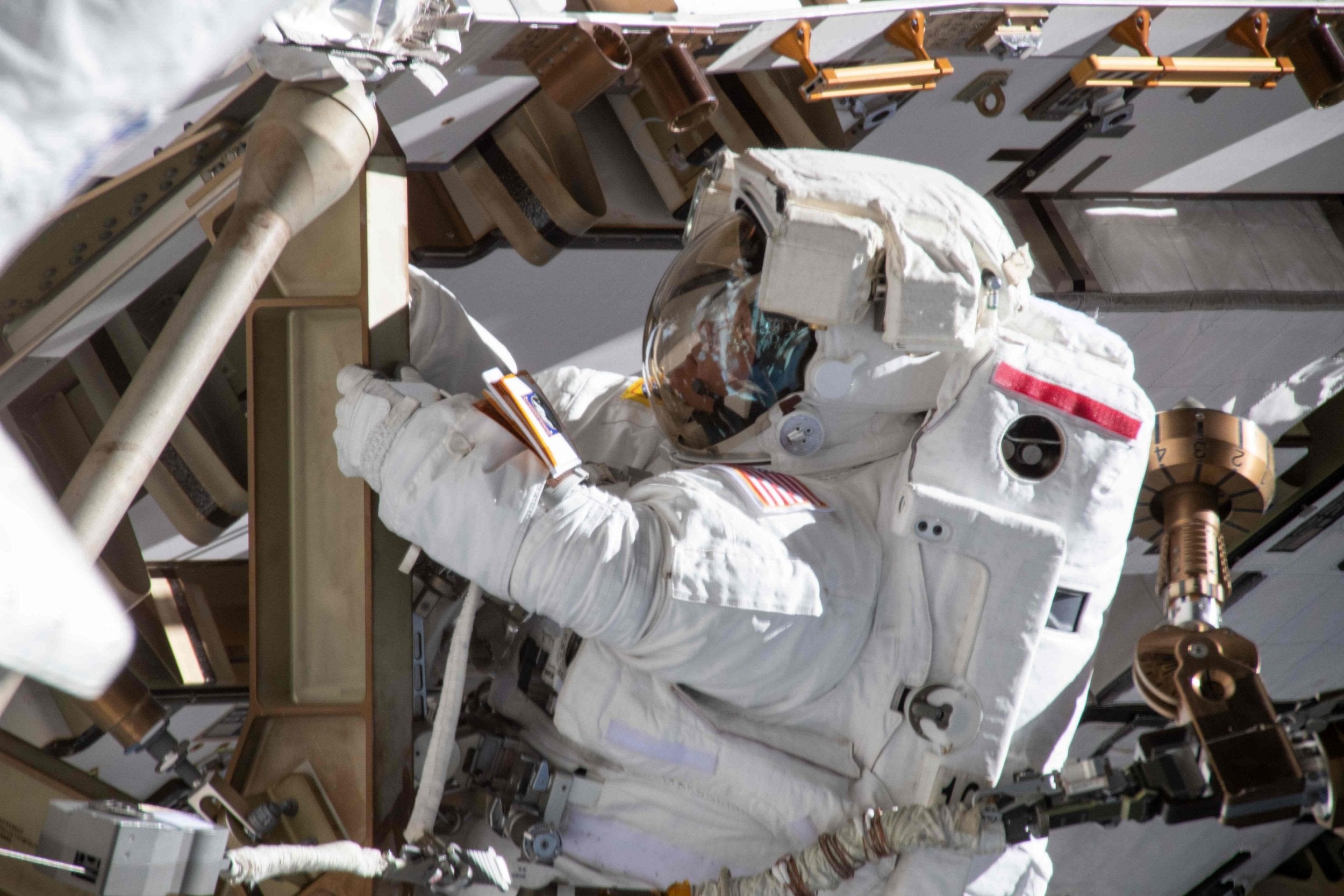 Astronaut Anne McClain on the International Space Station's Port-4 truss structure