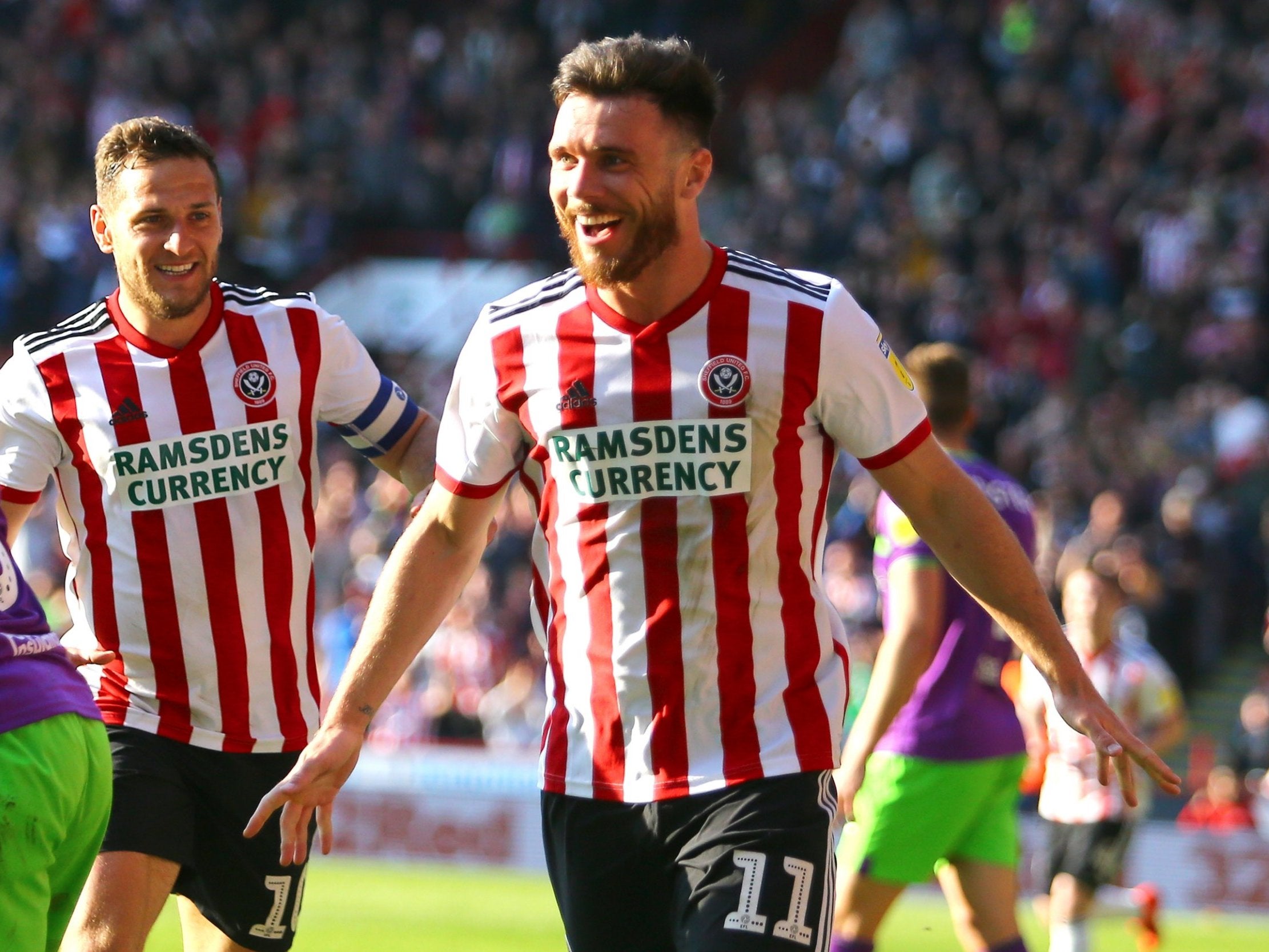 Scott Hogan celebrates scoring for Sheffield