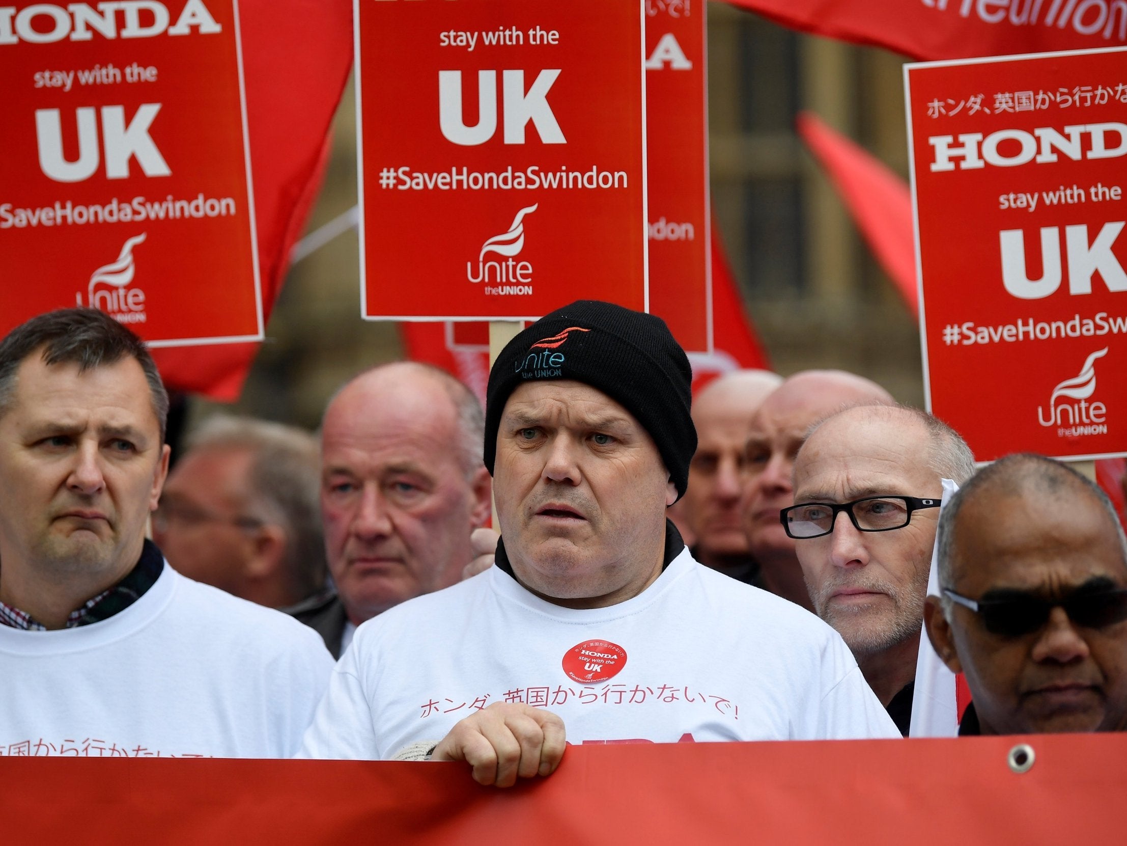 Honda employees stage rally against planned closure of Swindon plant outside Parliament in early March