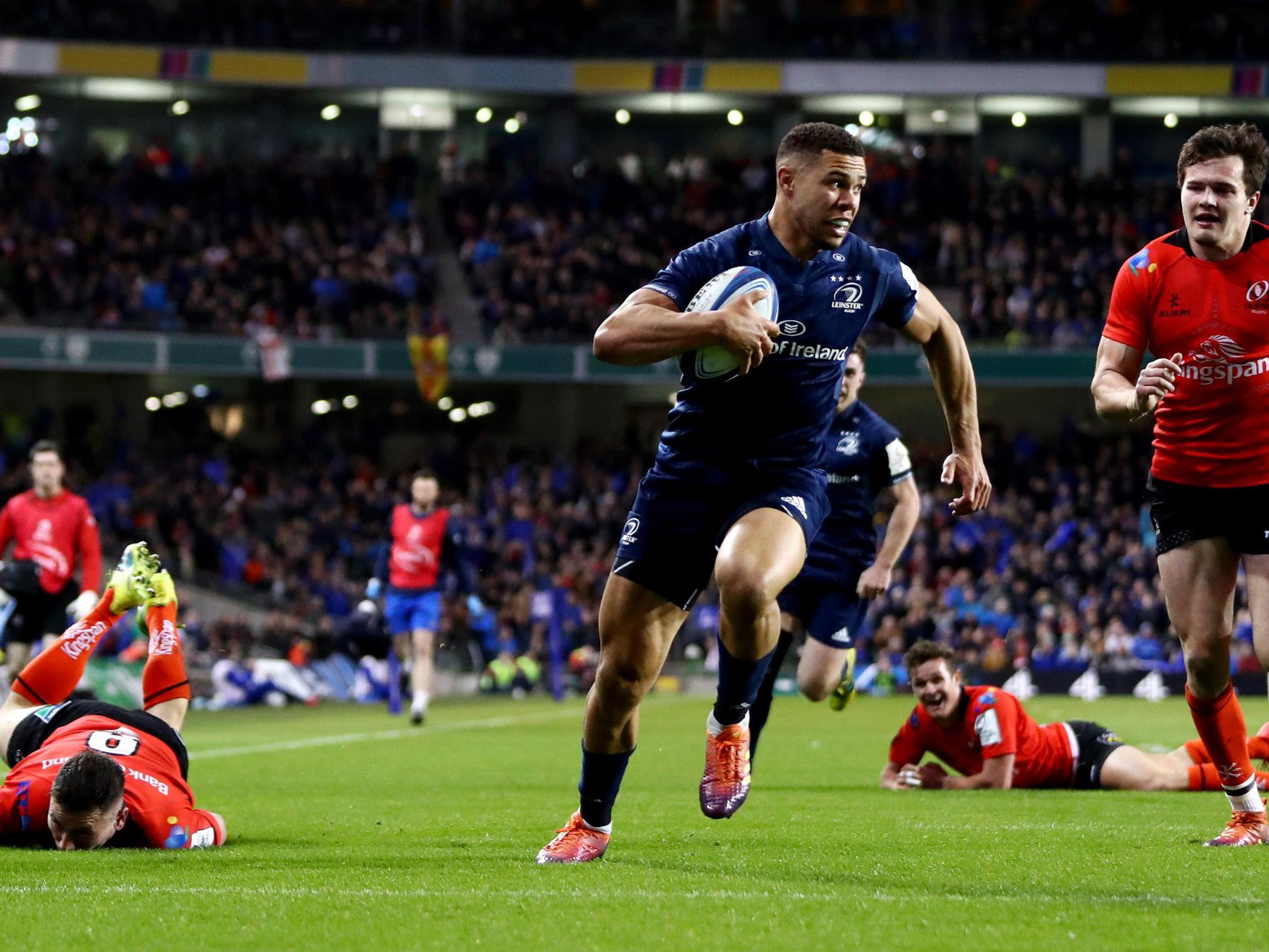 Adam Byrne breaks with the ball to score Leinster's second try of the match