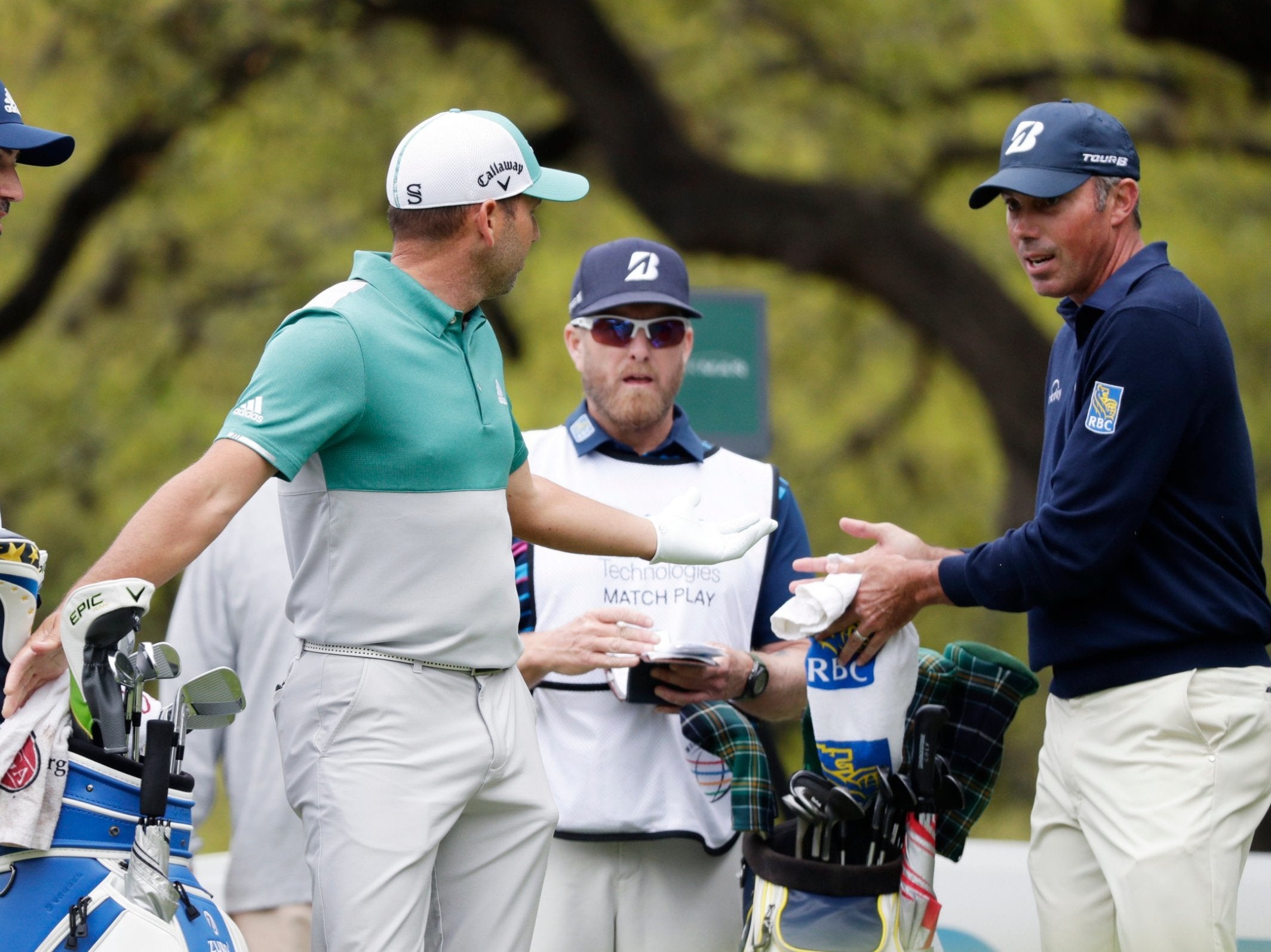 Sergio Garcia argues with Matt Kuchar during their controversial quarter-final clash