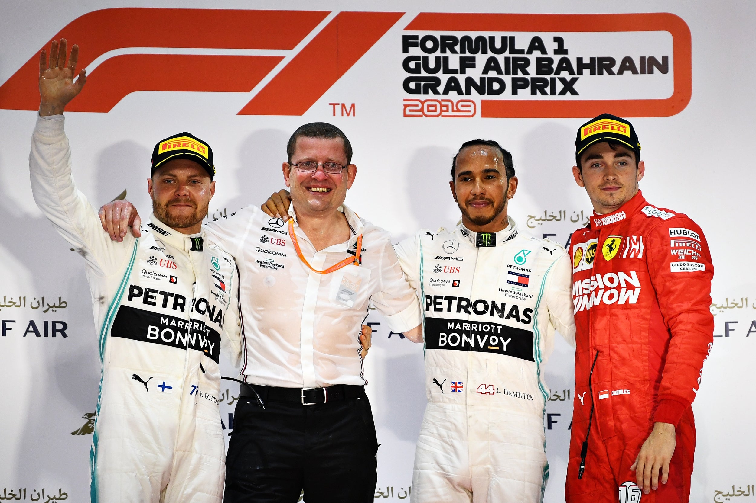 Hamilton celebrates the victory with Bottas and a dejected Leclerc (Getty)