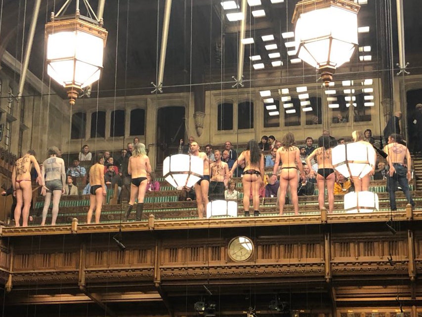 Extinction Rebellion protesters strip in the Commons public gallery to draw attention to climate change