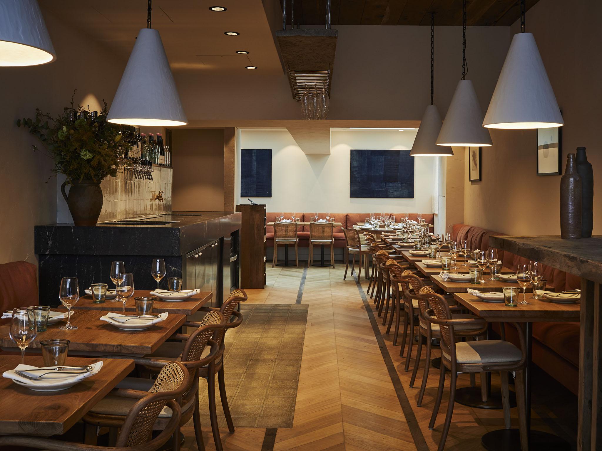 The muted and natural tones of the well-designed interior make it a warming space