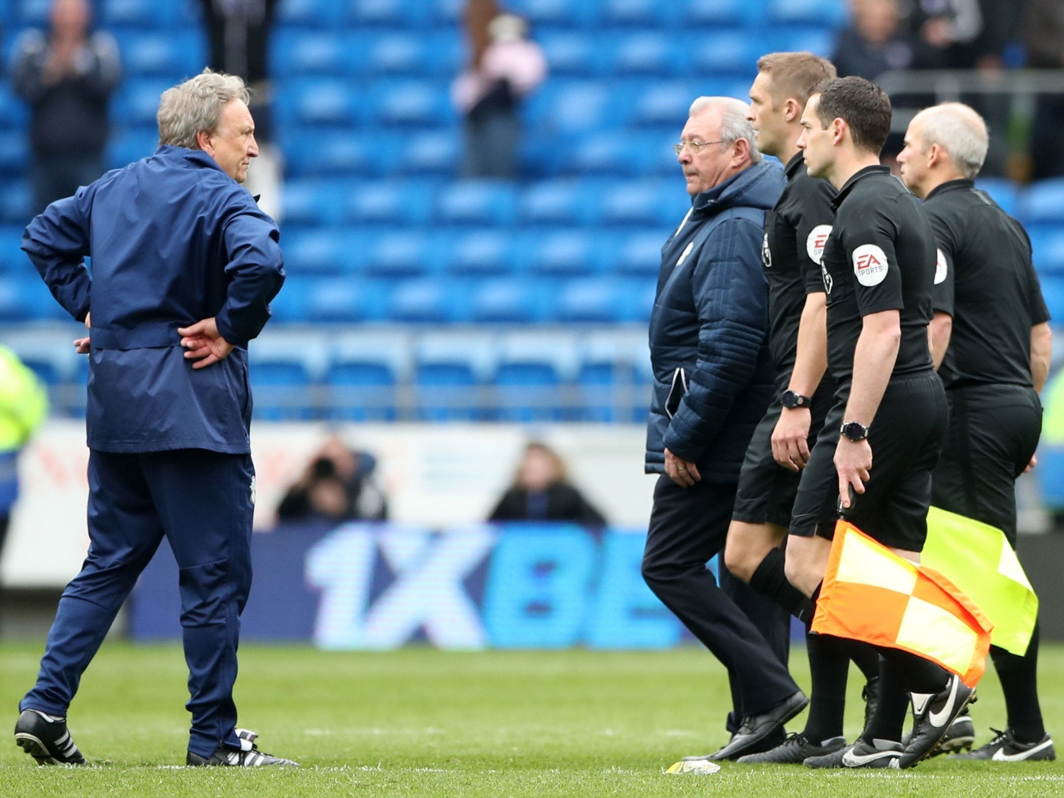 Cardiff City manager Neil Warnock faces the officials