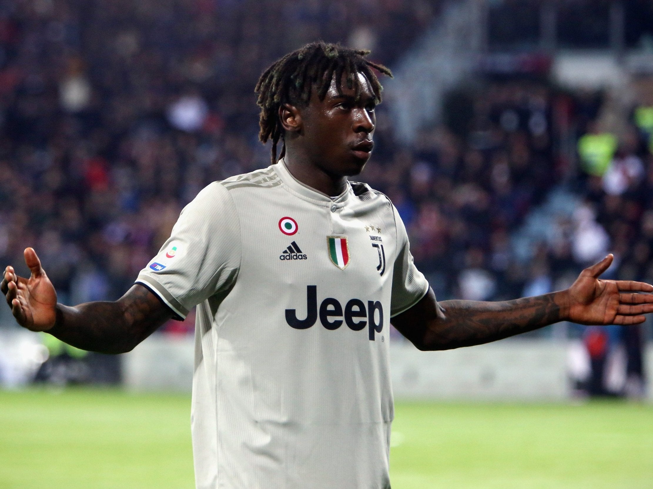 Kean celebrated his goal in front of the Cagliari fans